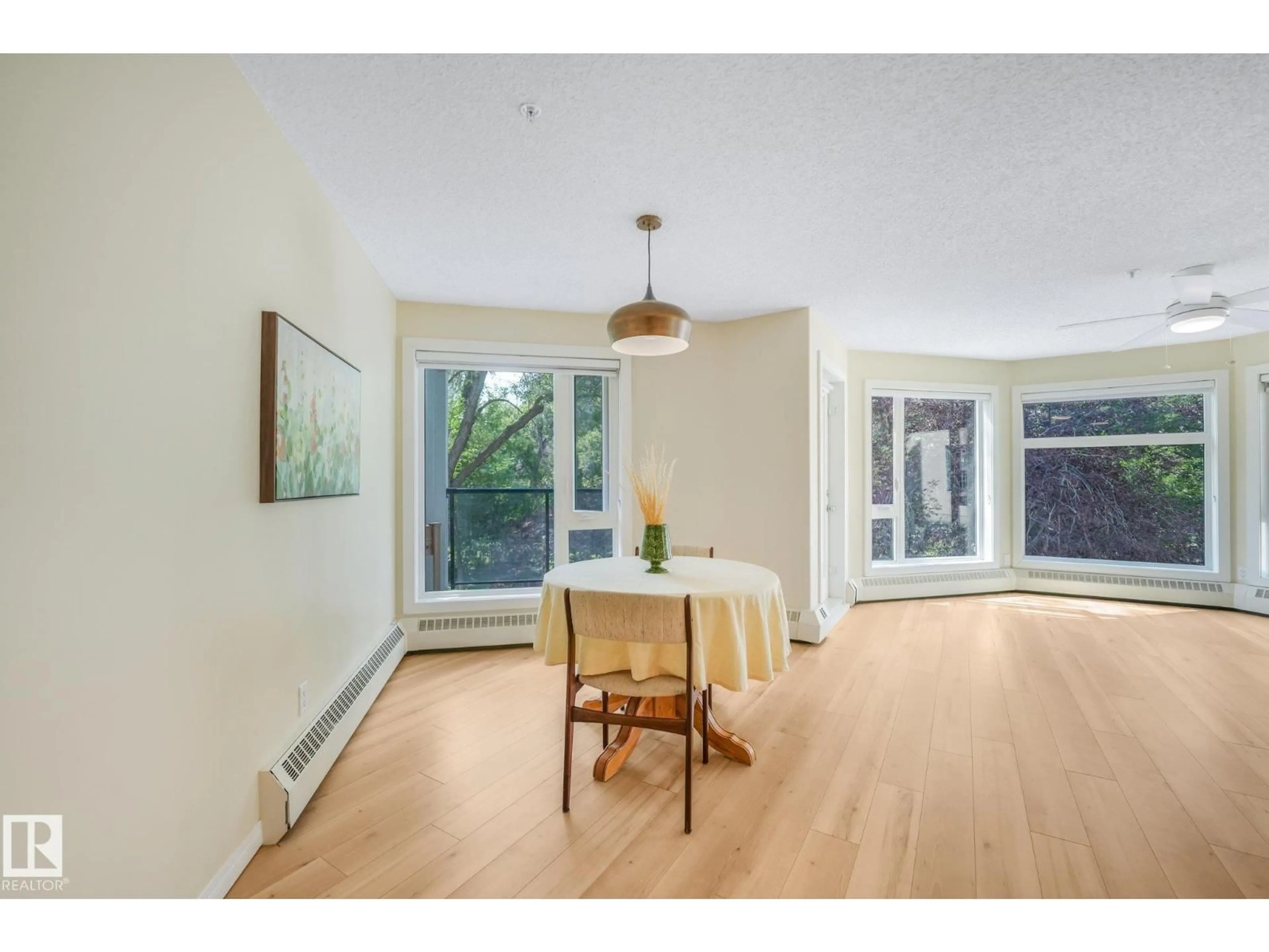 Dining room, wood/laminate floor for #206 - 9905 112 ST, Edmonton Alberta T5K1L6