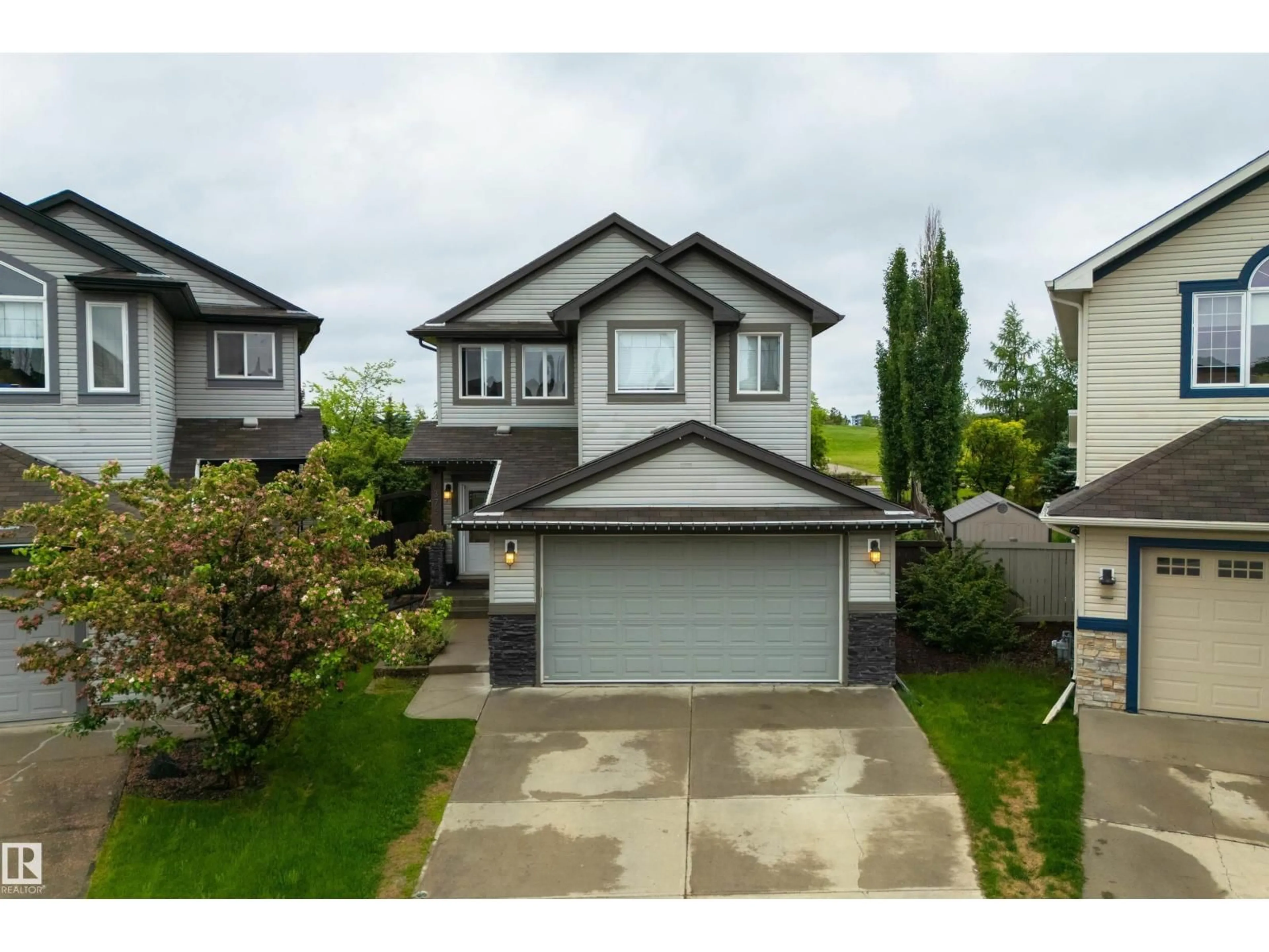 A pic from outside/outdoor area/front of a property/back of a property/a pic from drone, street for 1375 113 ST, Edmonton Alberta T6W0N6