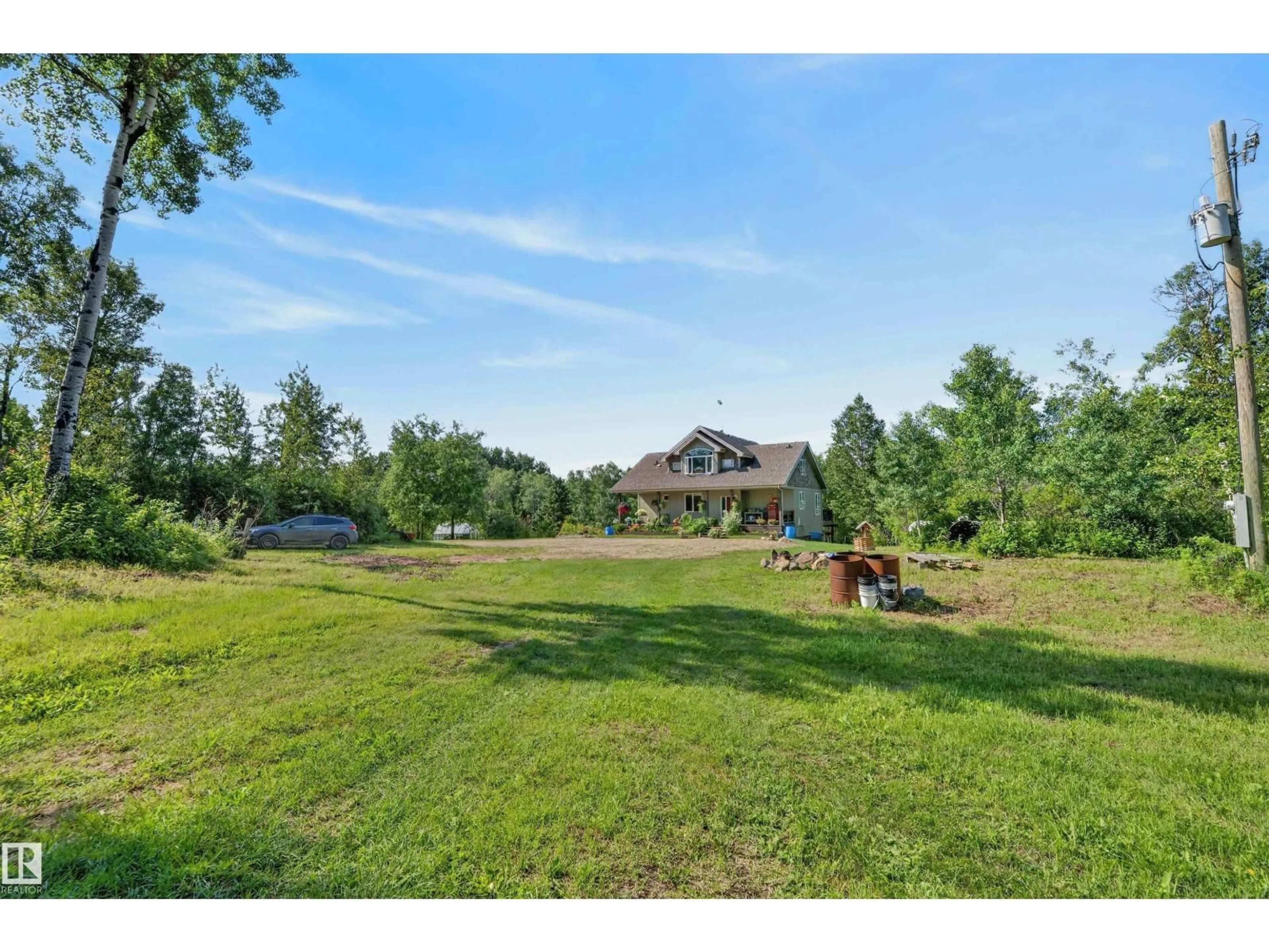 A pic from outside/outdoor area/front of a property/back of a property/a pic from drone, water/lake/river/ocean view for 59122 RGE ROAD 233, Rural Westlock County Alberta T0G2J0