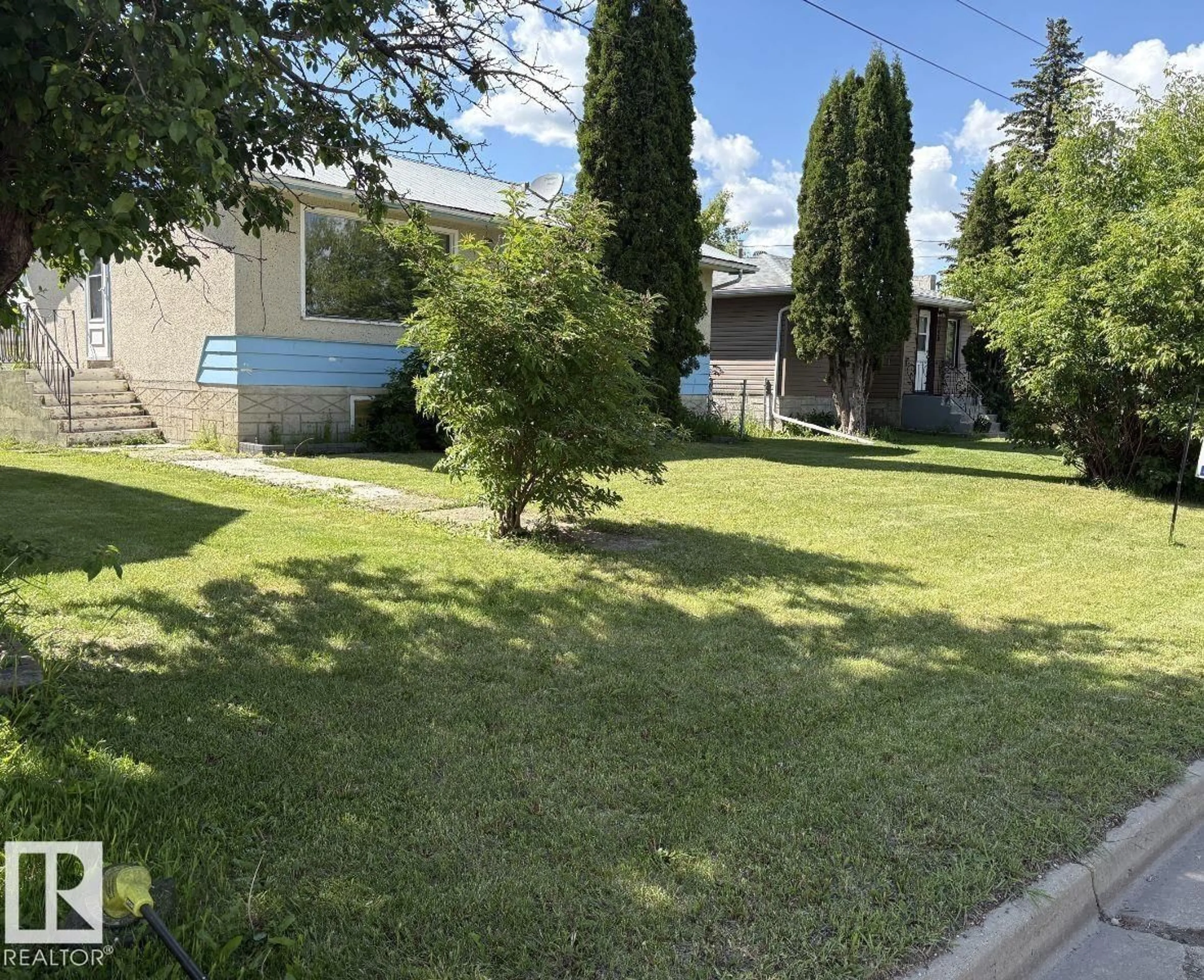 A pic from outside/outdoor area/front of a property/back of a property/a pic from drone, street for 5024 50 ST, Andrew Alberta T0B0C0