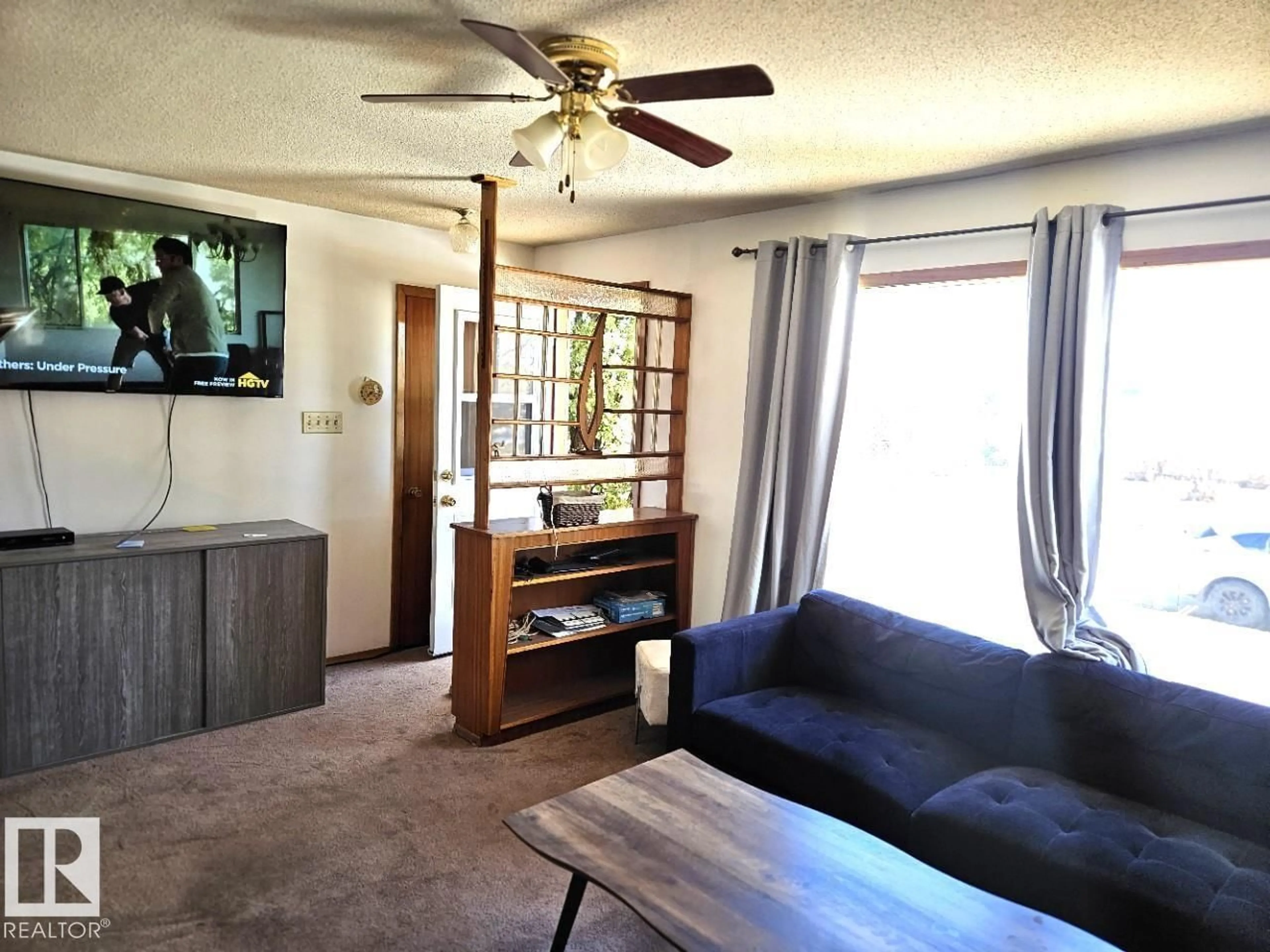 Living room with furniture, unknown for 5024 50 ST, Andrew Alberta T0B0C0