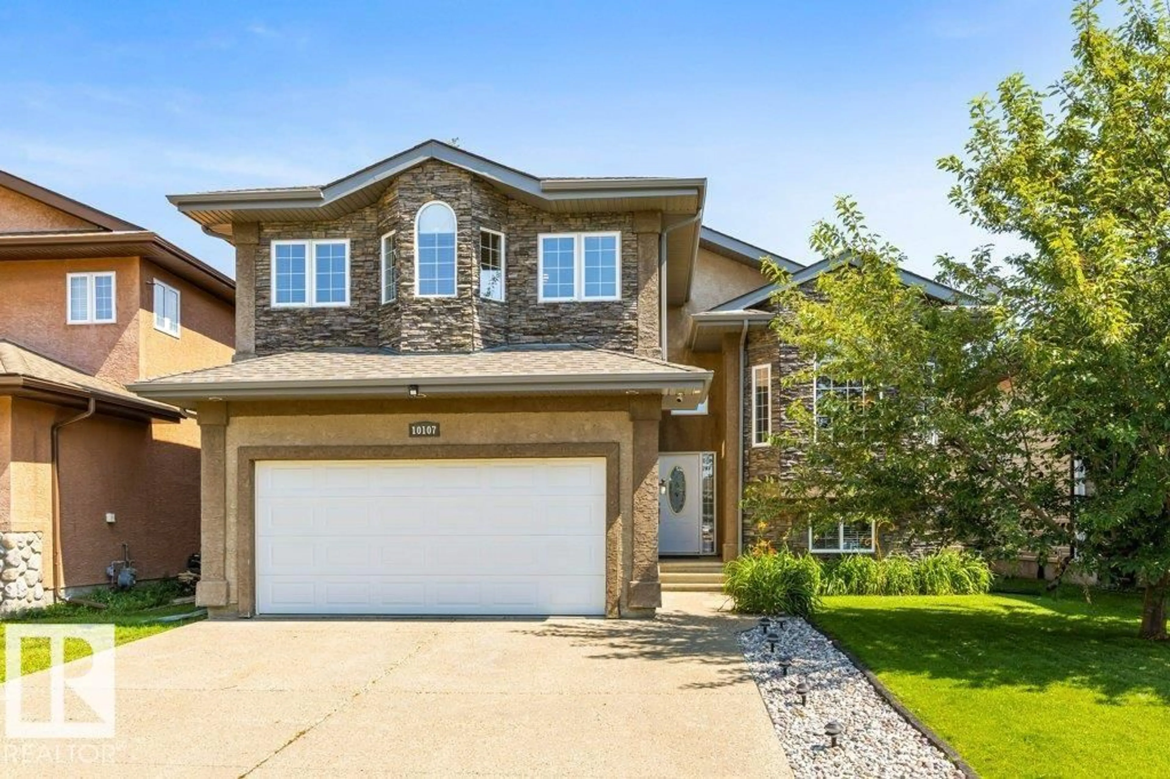 Home with vinyl exterior material, street for 10107 97 ST, Morinville Alberta T8R0C8