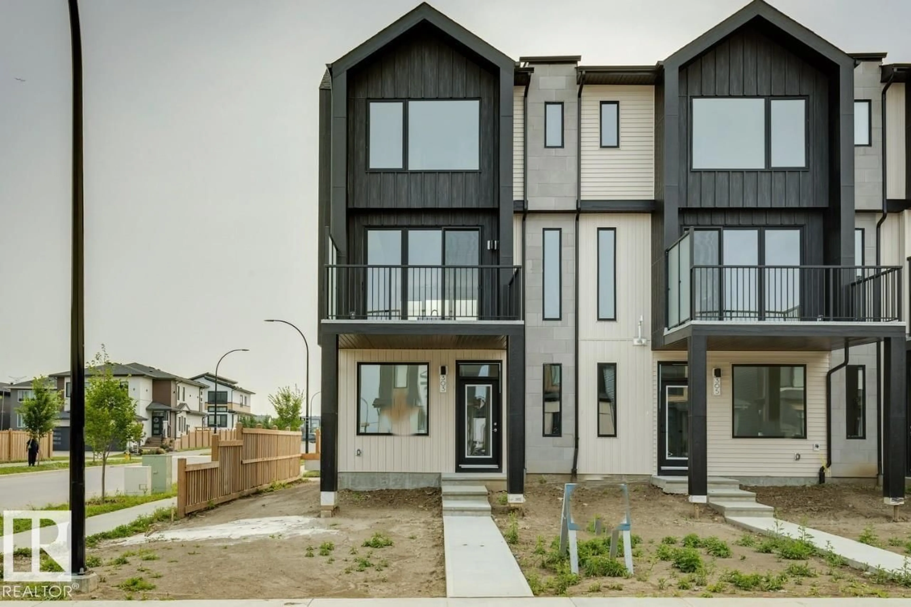 Home with vinyl exterior material, street for SW - 303 32 ST, Edmonton Alberta T6X3C8