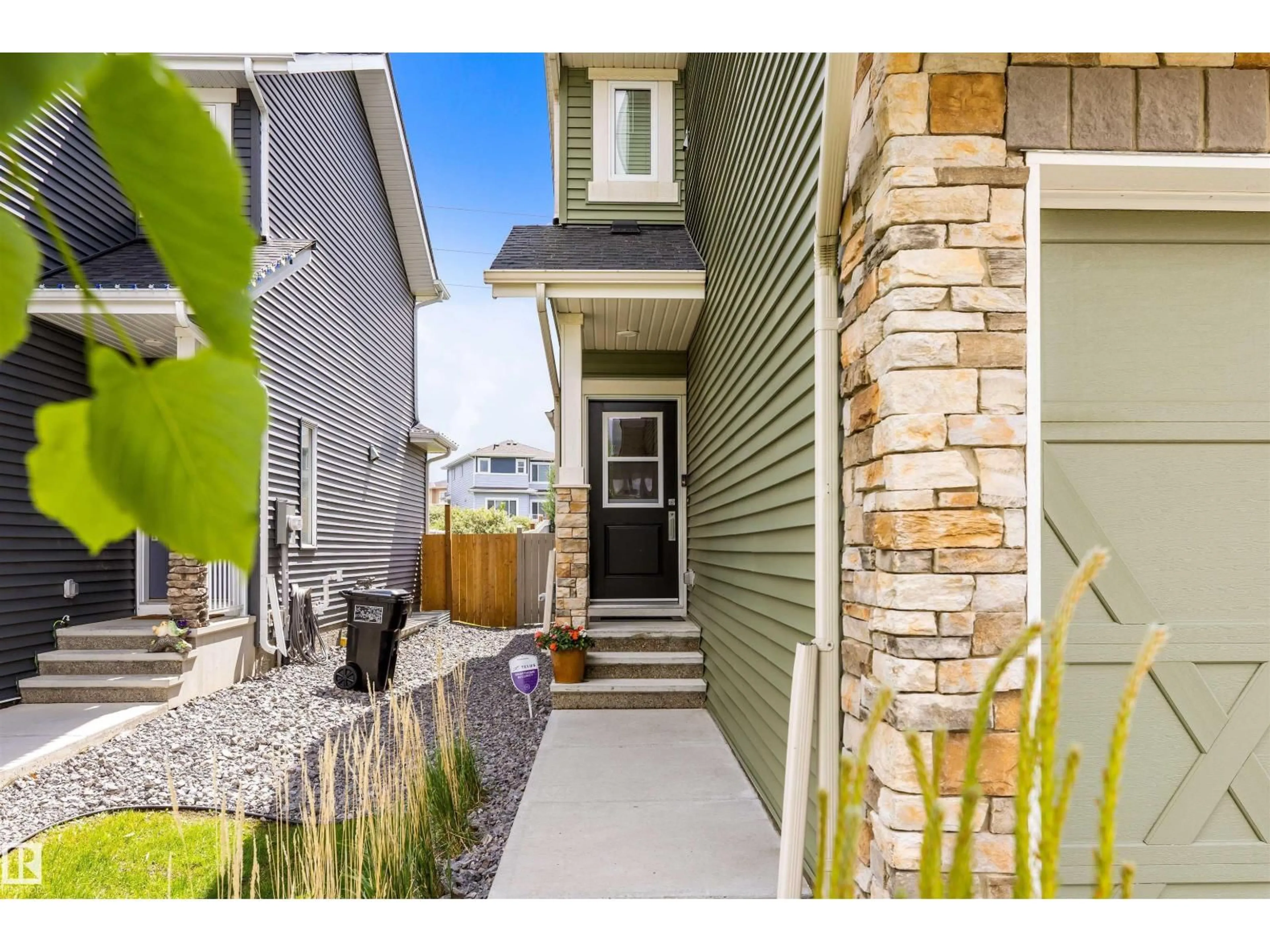 Home with vinyl exterior material, street for NW - 12833 205 ST, Edmonton Alberta T5S0L7