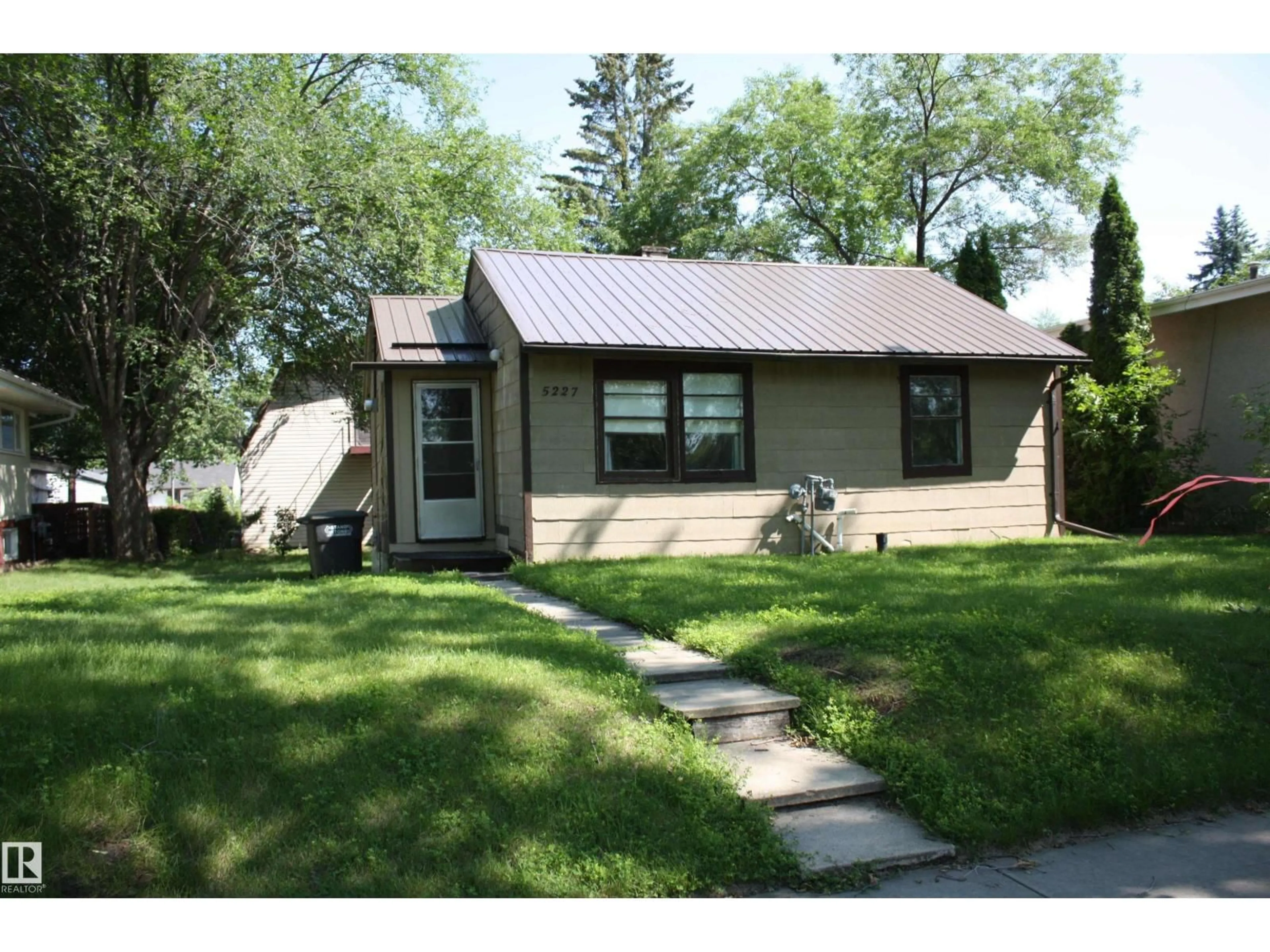 Home with vinyl exterior material, street for 5227 51 STREET, Redwater Alberta T0A2W0