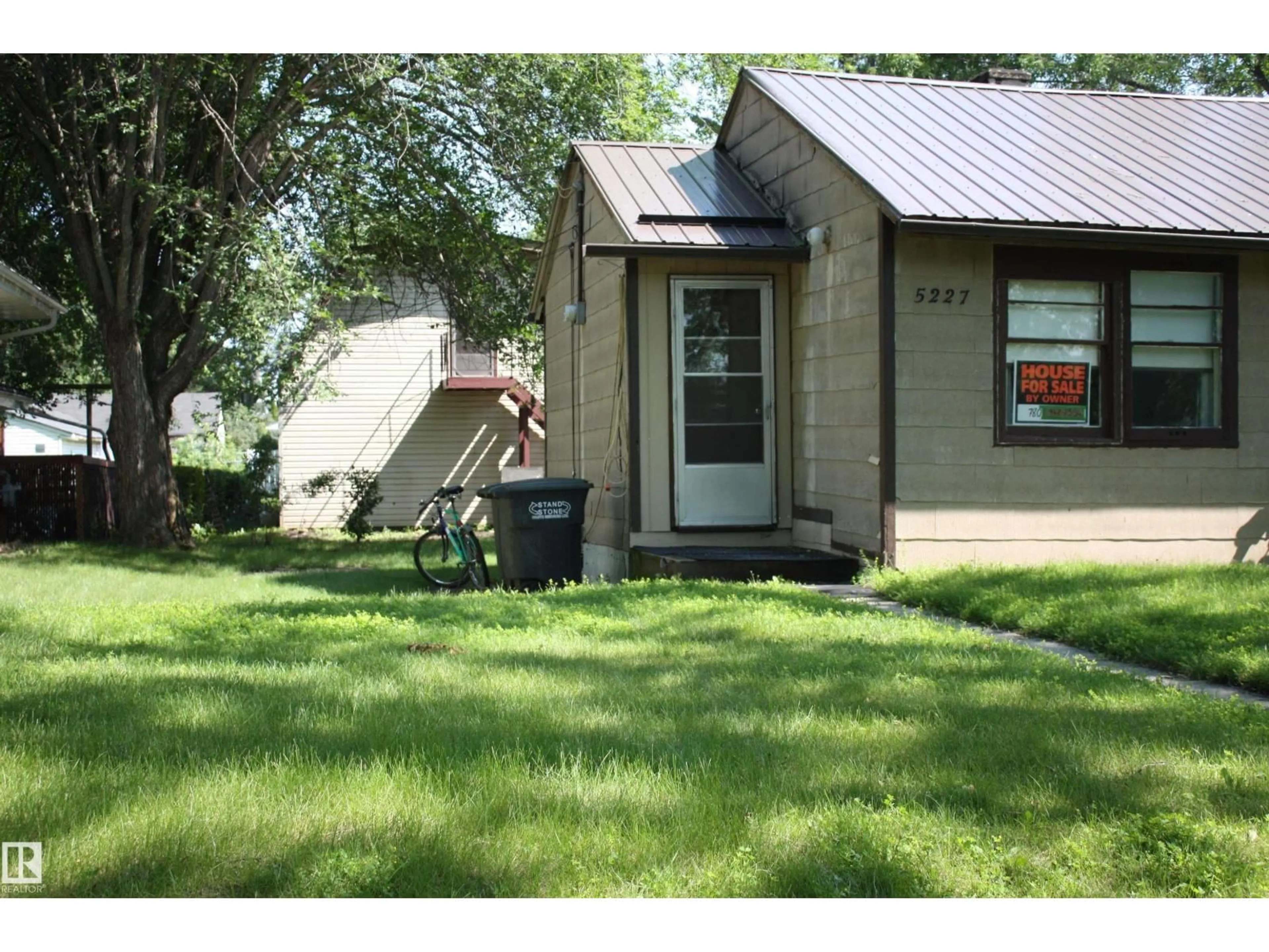 Home with vinyl exterior material, street for 5227 51 STREET, Redwater Alberta T0A2W0