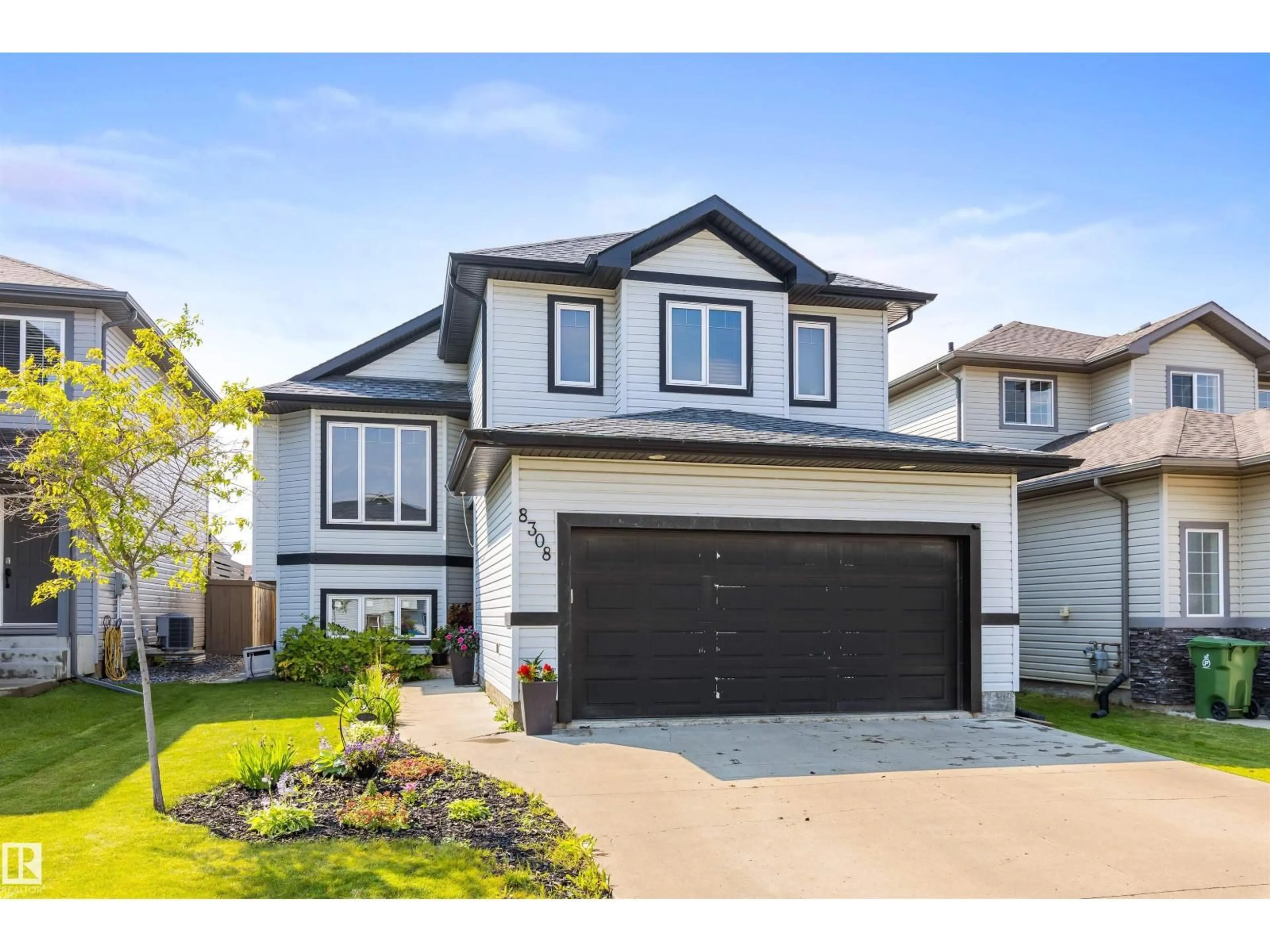 Home with vinyl exterior material, street for 8308 97 ST, Morinville Alberta T8R0A6