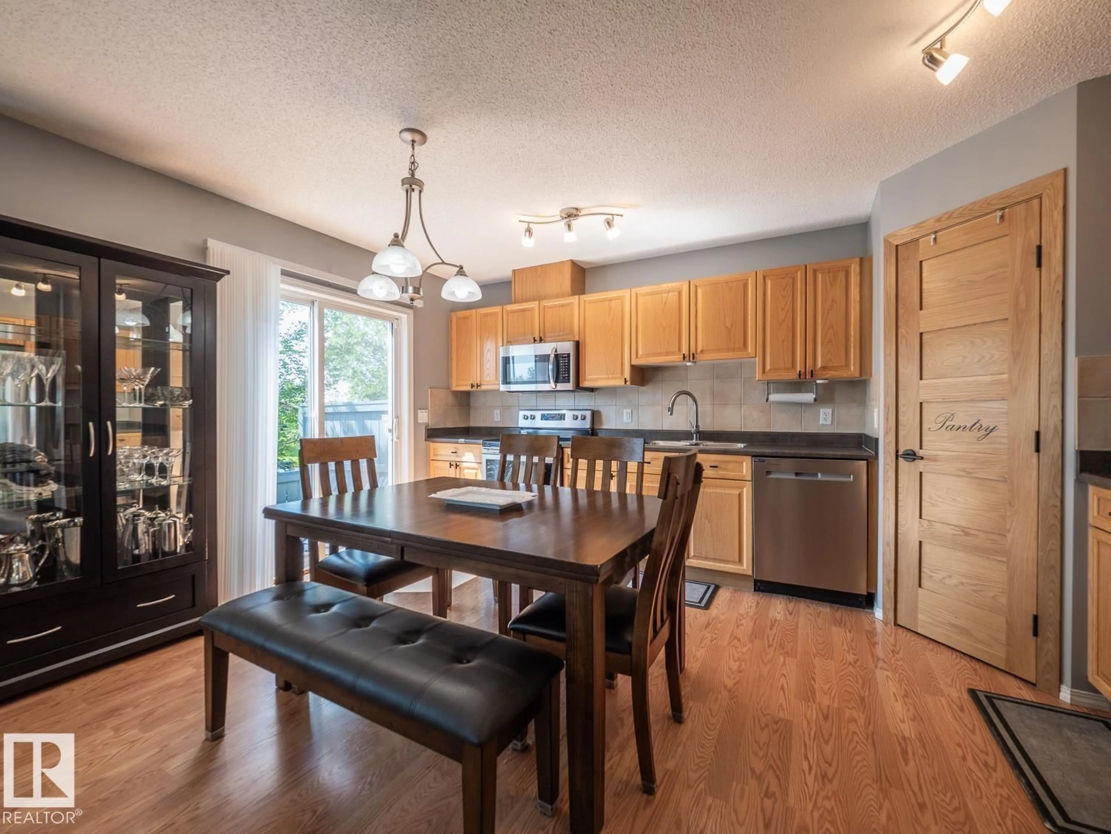 Open concept kitchen, wood/laminate floor for #42 - 450 HYNDMAN CR, Edmonton Alberta T5A0E2