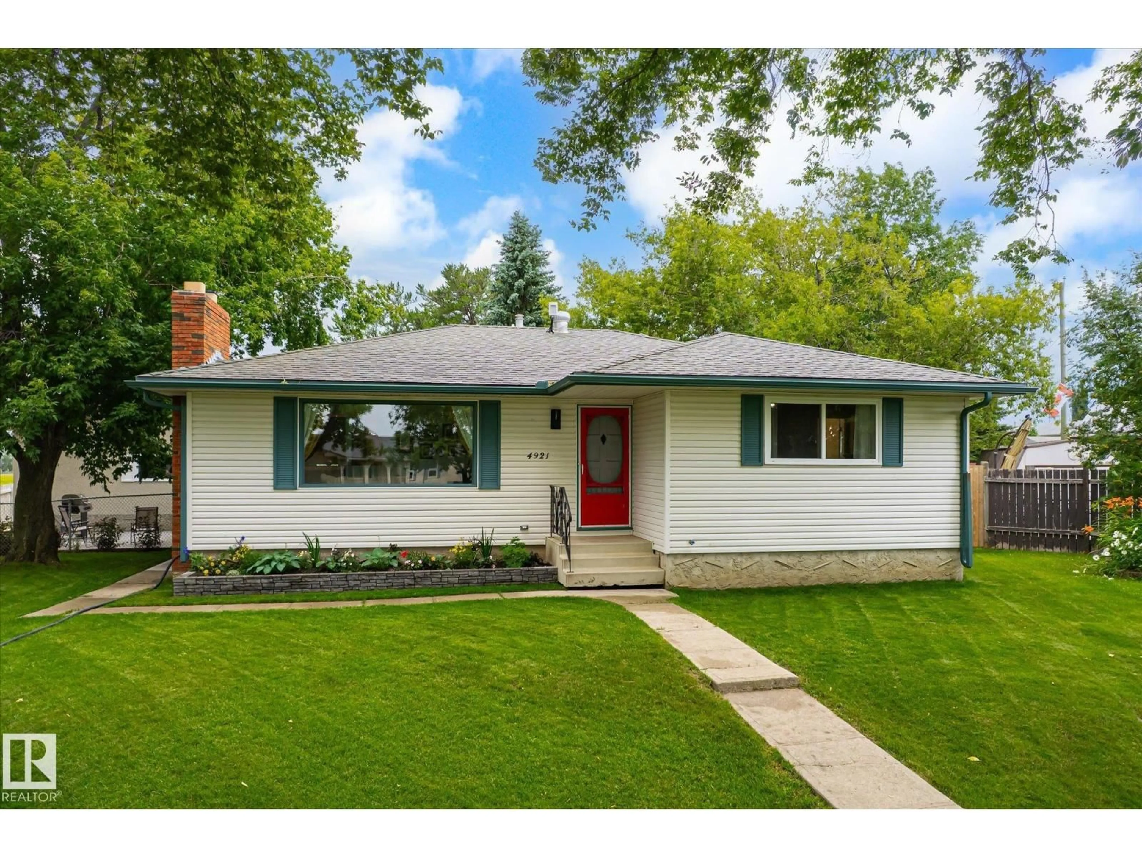 Home with vinyl exterior material, street for 4921 47 AV, Legal Alberta T0G1L0