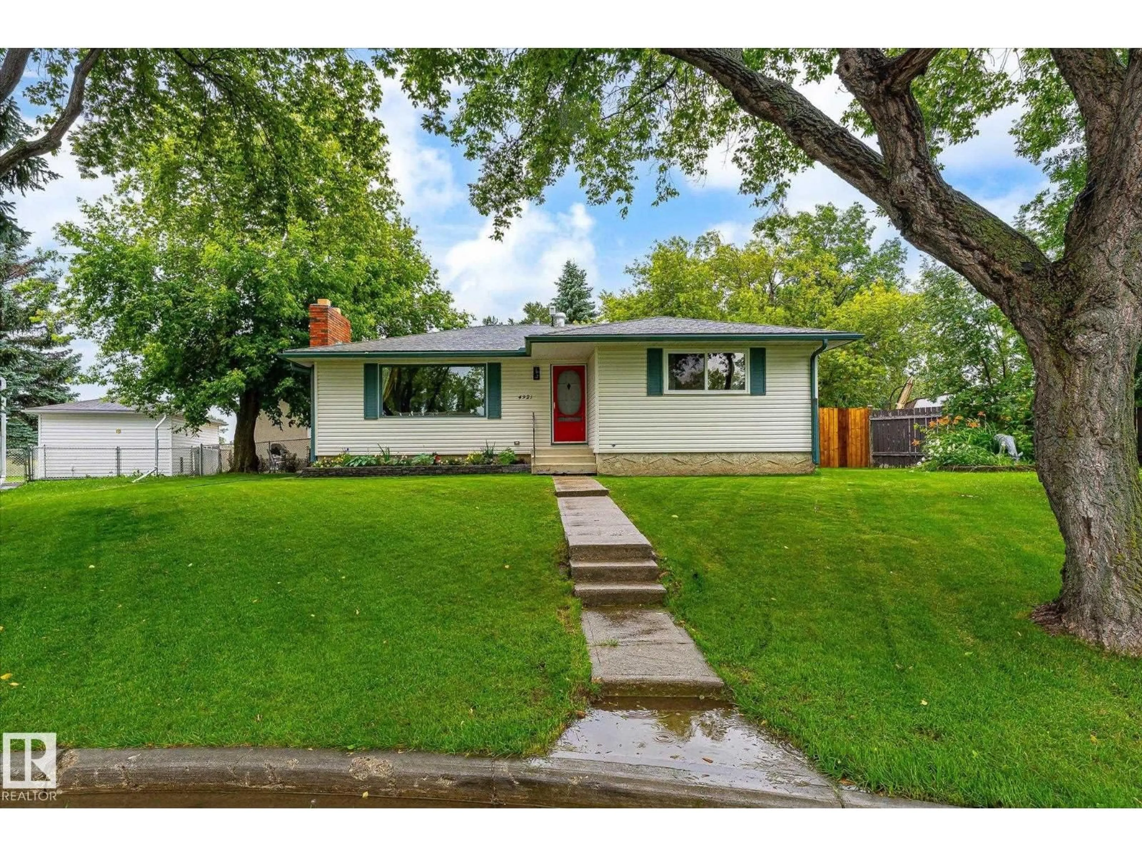 Home with vinyl exterior material, street for 4921 47 AV, Legal Alberta T0G1L0