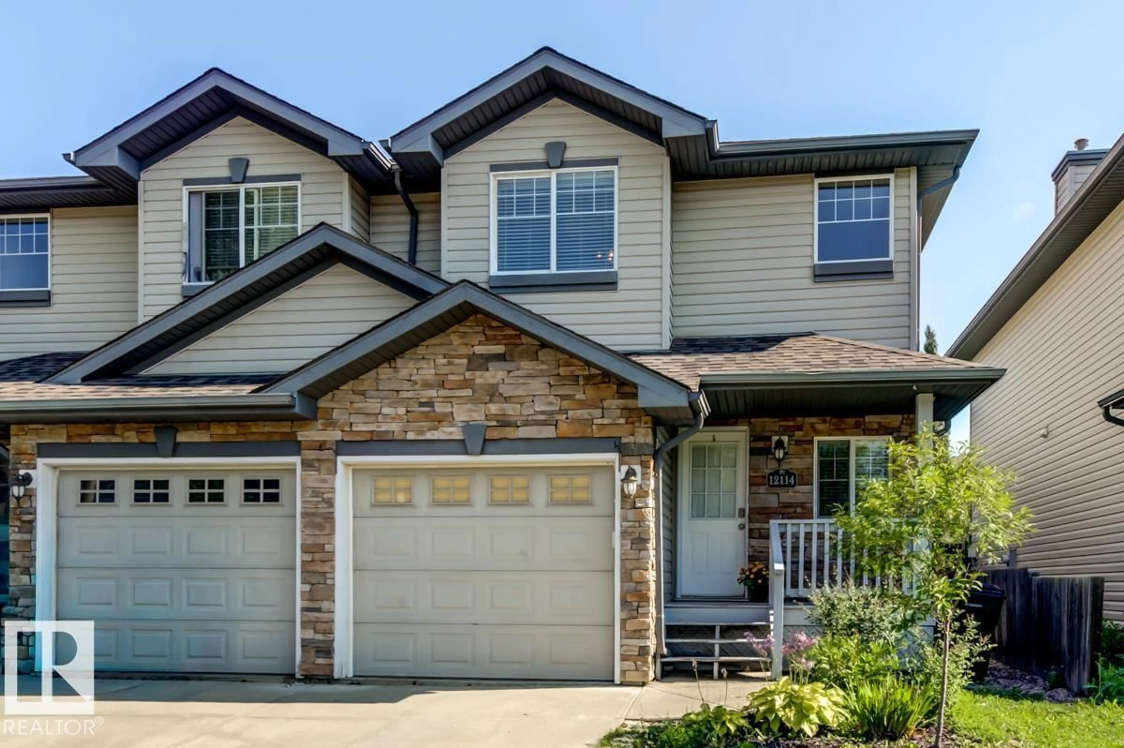 Home with brick exterior material, street for 12114 16 AV, Edmonton Alberta T6W1L9