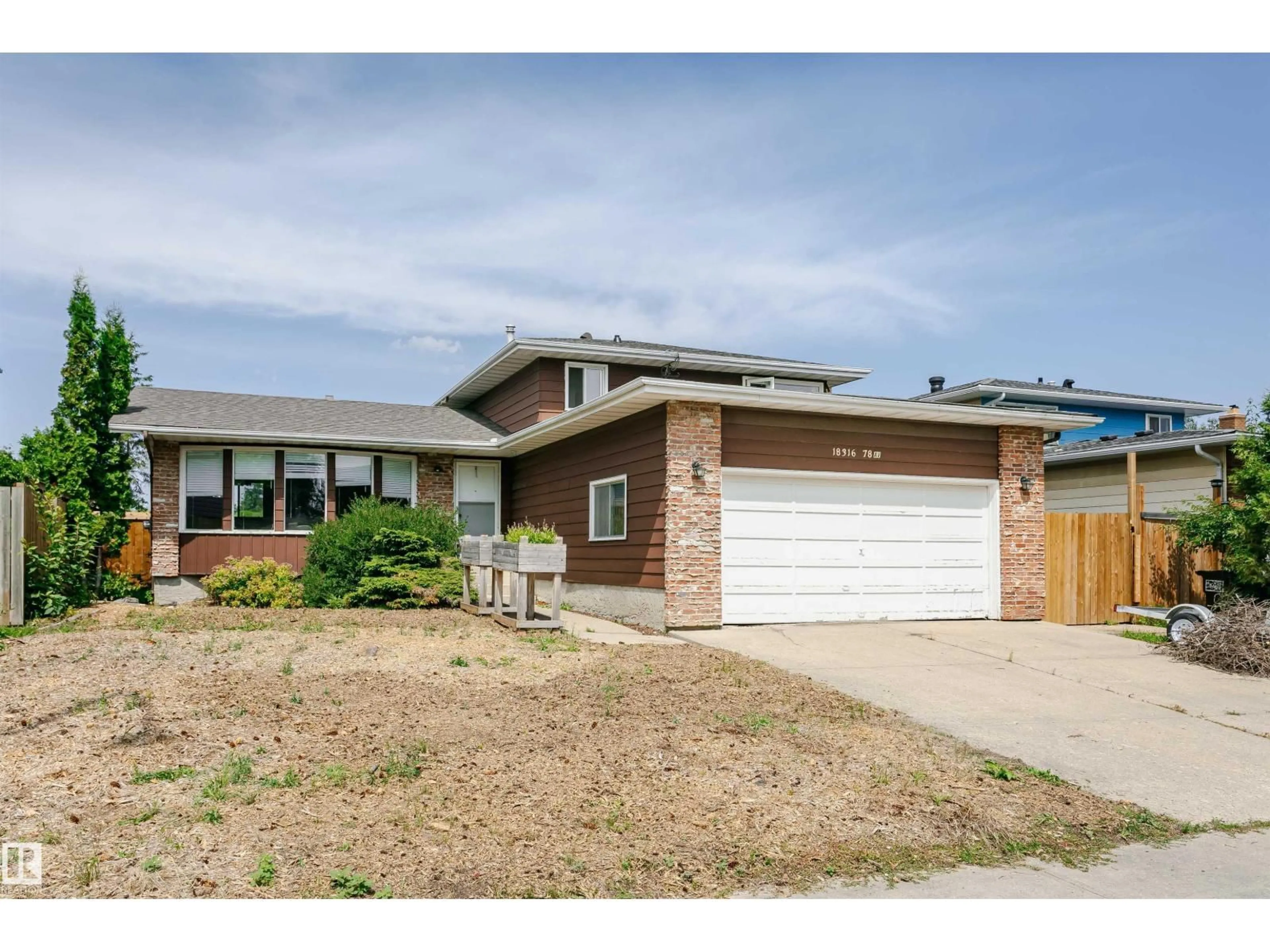 Home with brick exterior material, street for 18316 78 AV, Edmonton Alberta T5T2A9