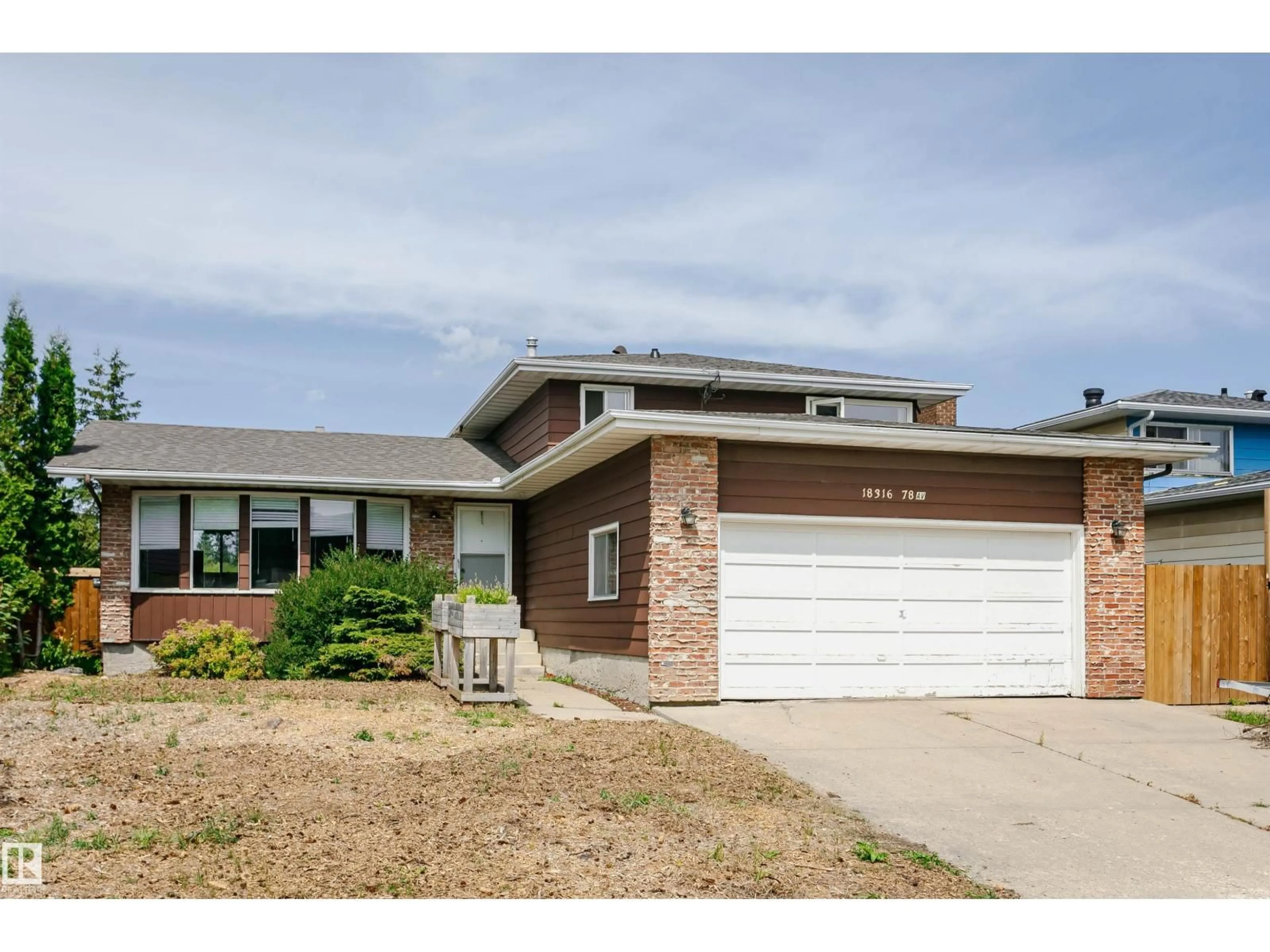 Home with brick exterior material, street for 18316 78 AV, Edmonton Alberta T5T2A9
