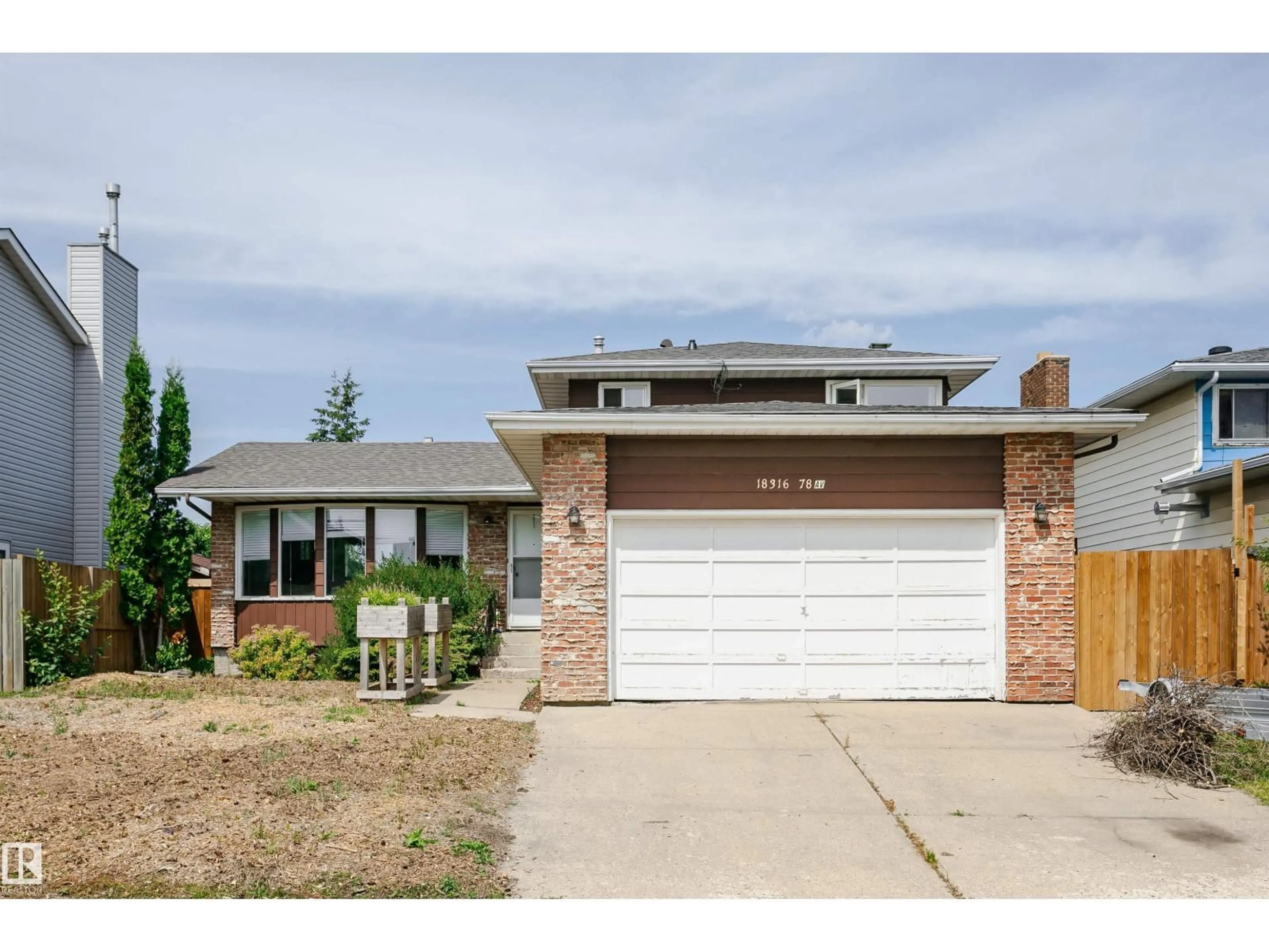 Home with brick exterior material, street for 18316 78 AV, Edmonton Alberta T5T2A9