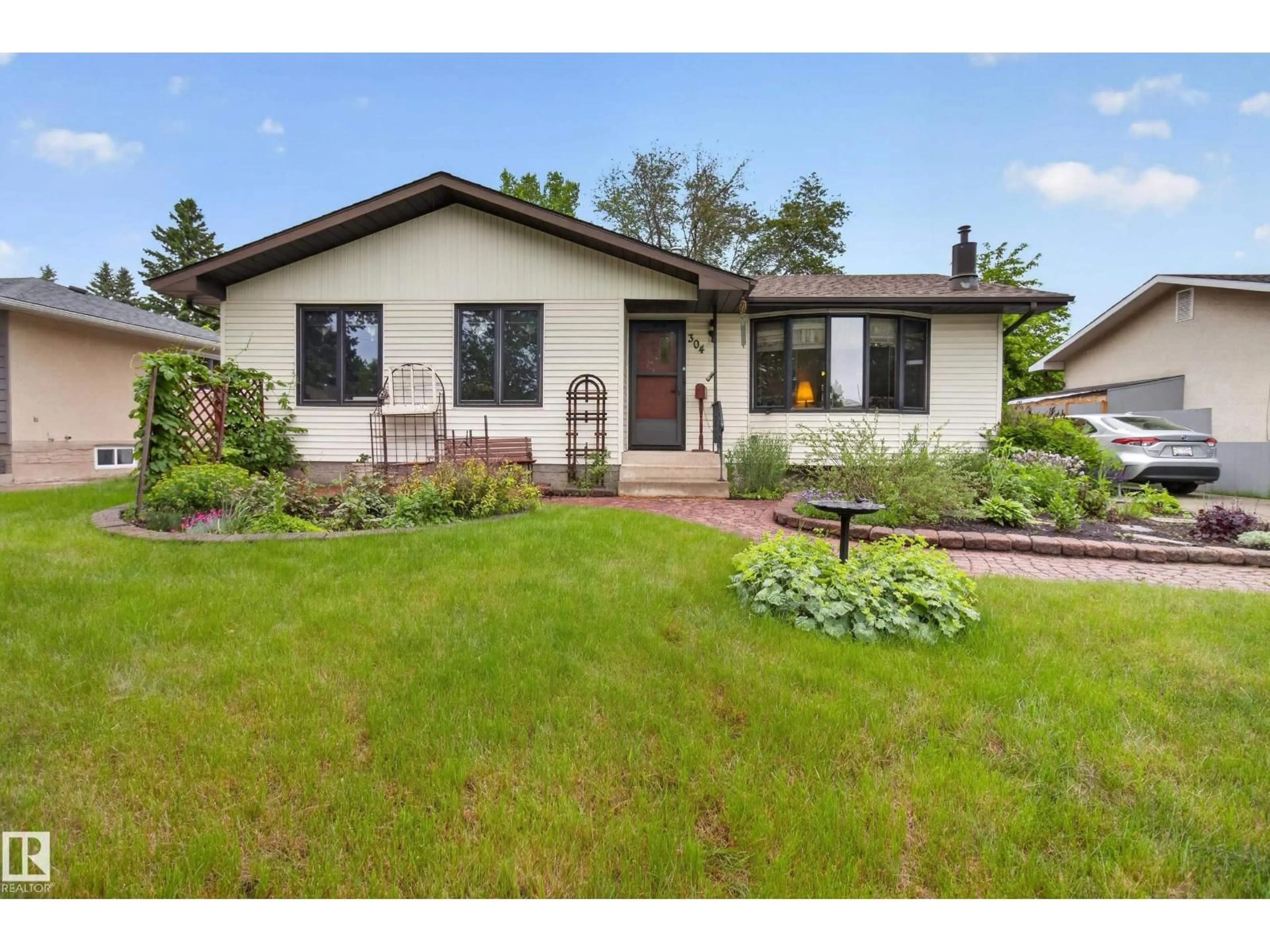 Home with brick exterior material, street for 304 FIR ST, Sherwood Park Alberta T8A2B3