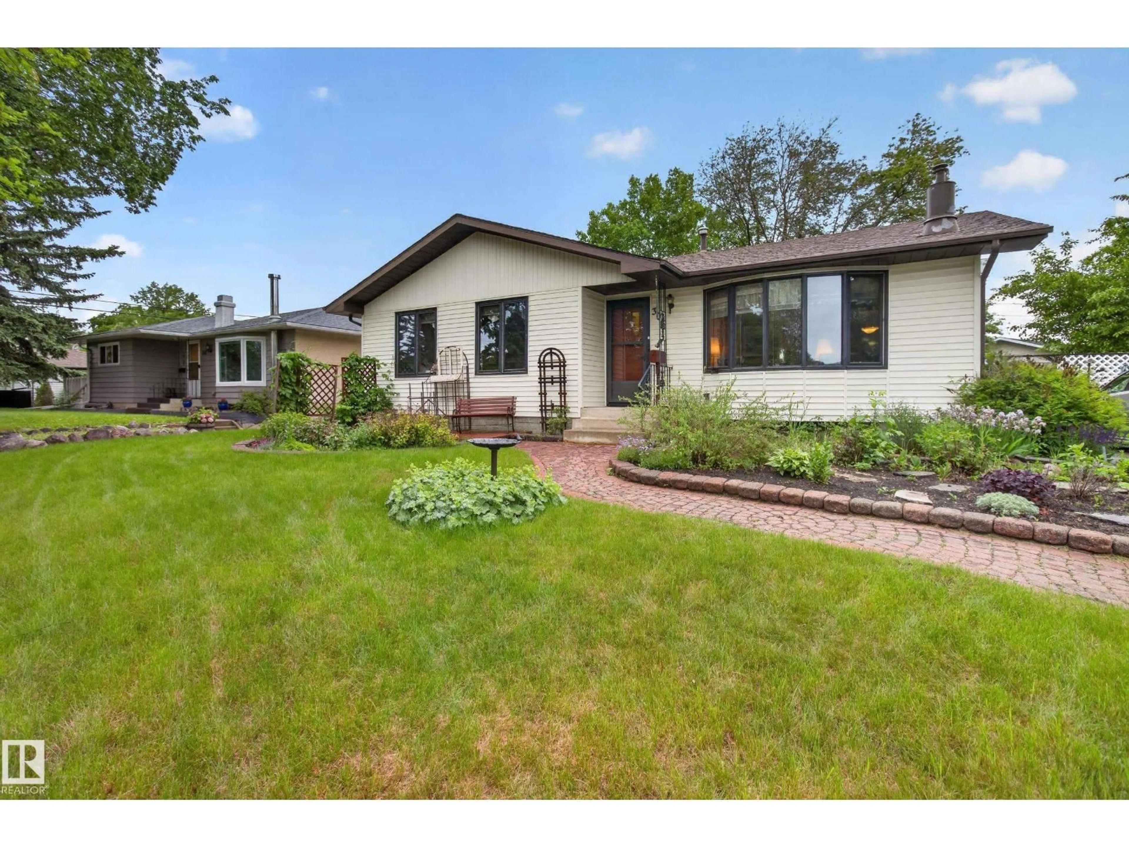 Home with brick exterior material, street for 304 FIR ST, Sherwood Park Alberta T8A2B3