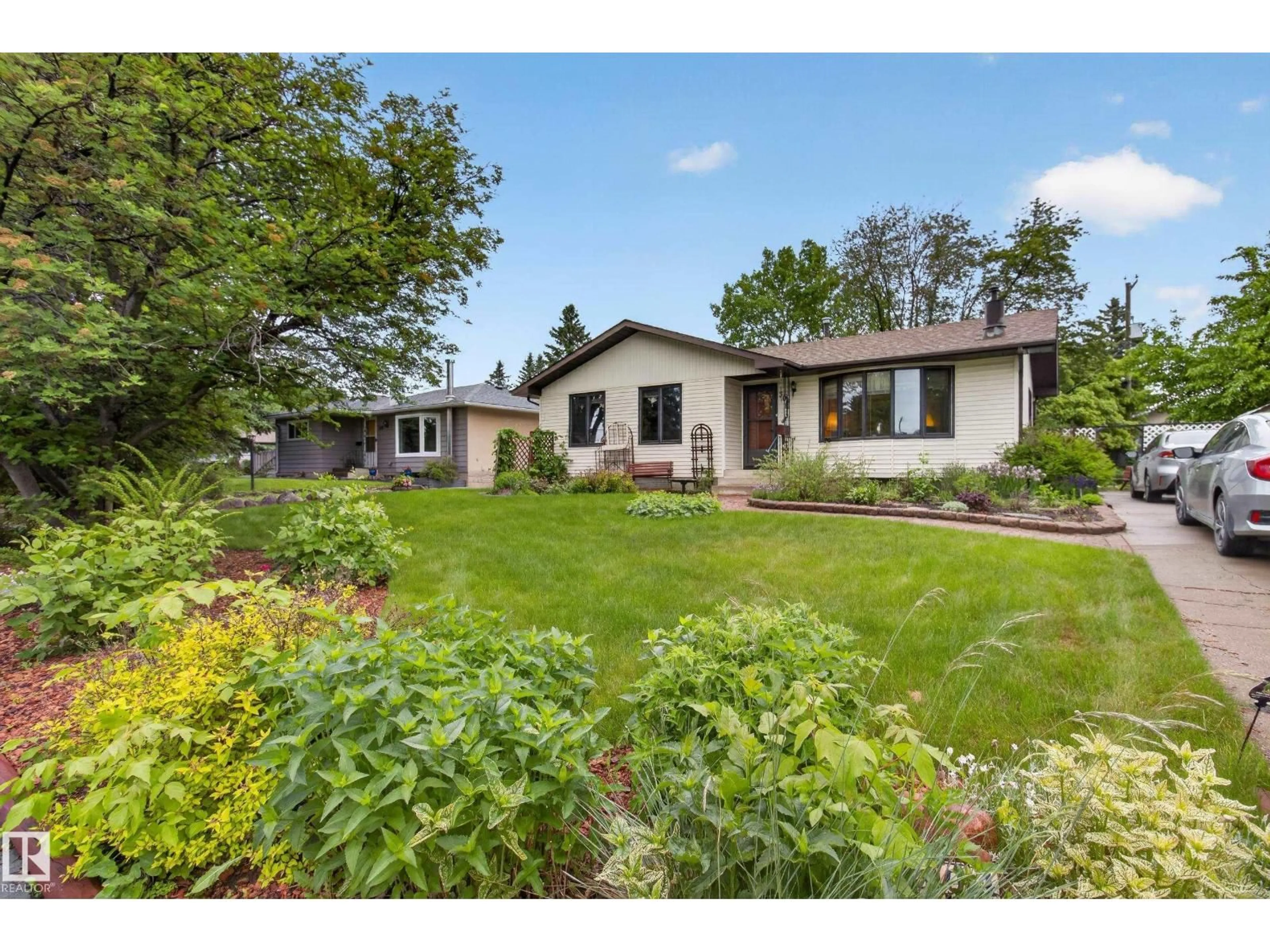 A pic from outside/outdoor area/front of a property/back of a property/a pic from drone, street for 304 FIR ST, Sherwood Park Alberta T8A2B3