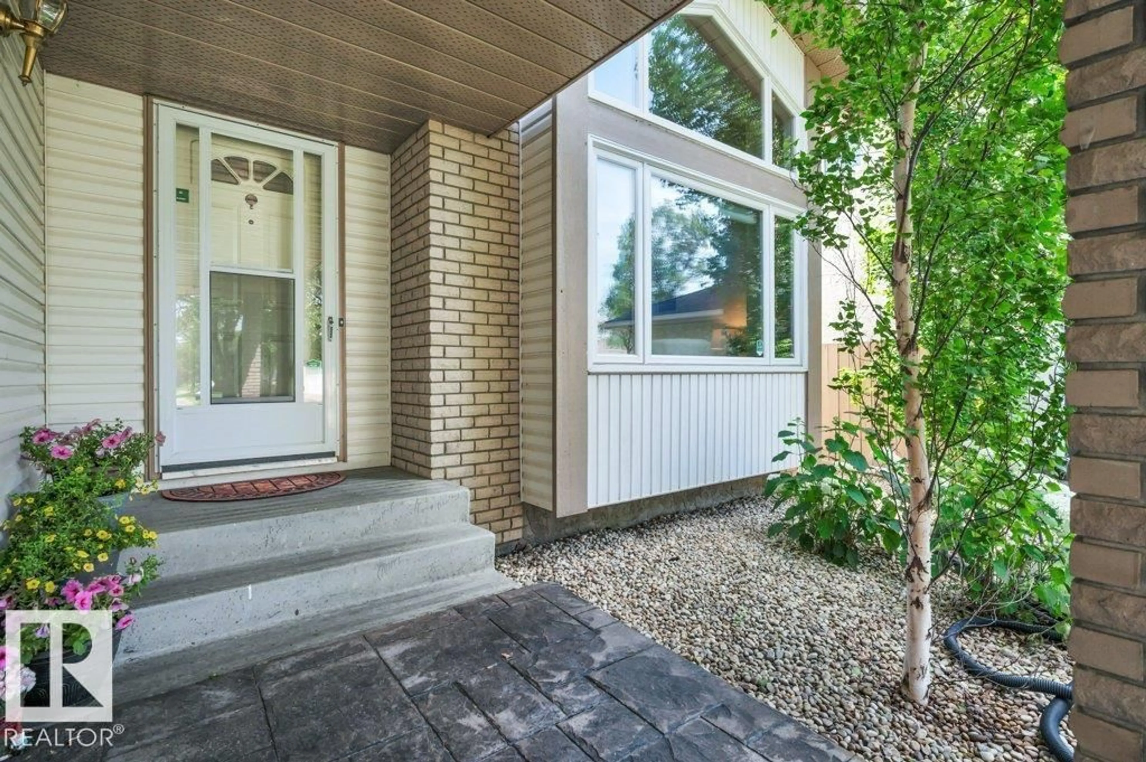 Home with brick exterior material, street for 568 BUCHANAN RD, Edmonton Alberta T6R2B7
