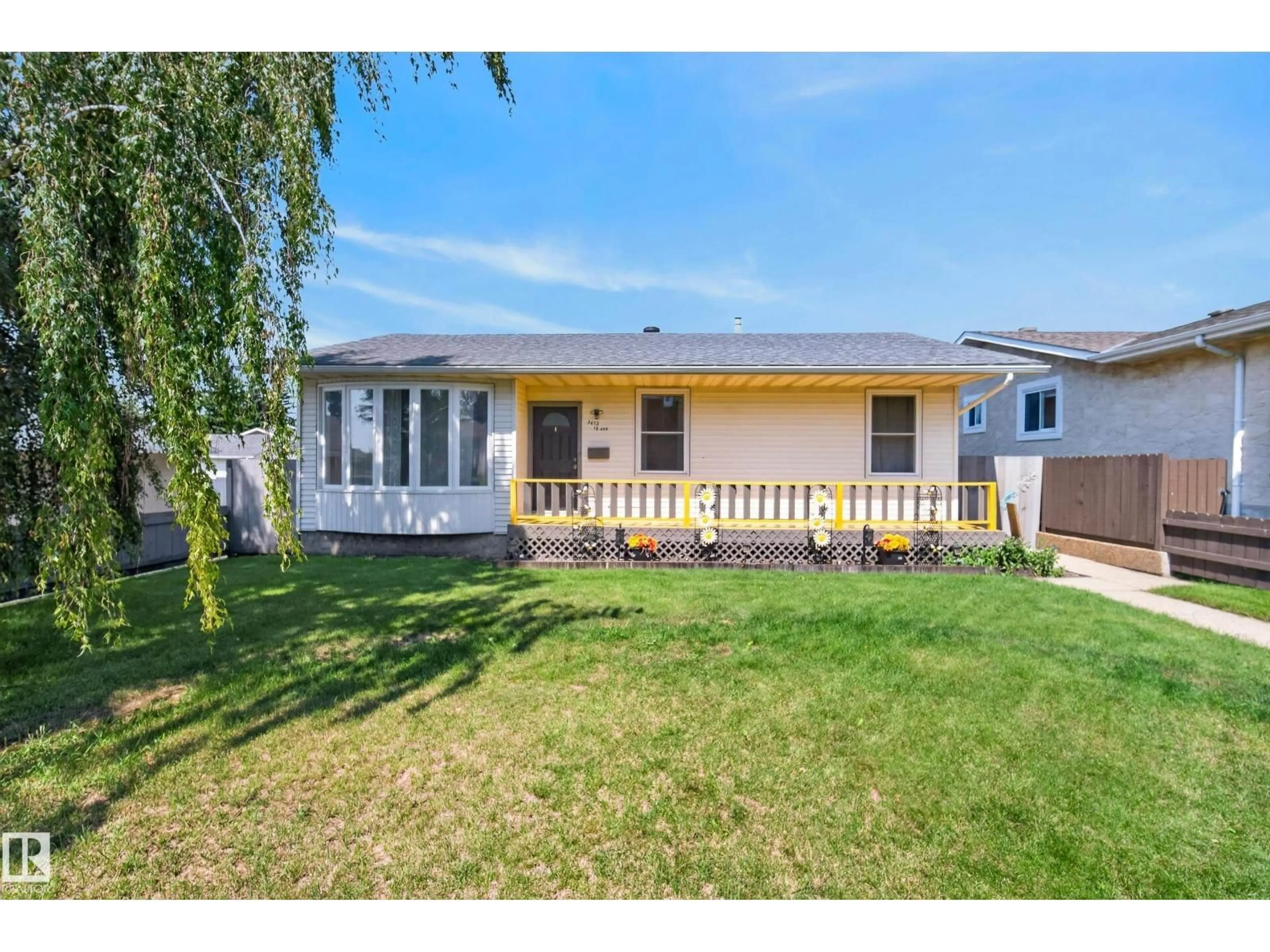 Home with vinyl exterior material, street for 3612 18 AV, Edmonton Alberta T6L3C2