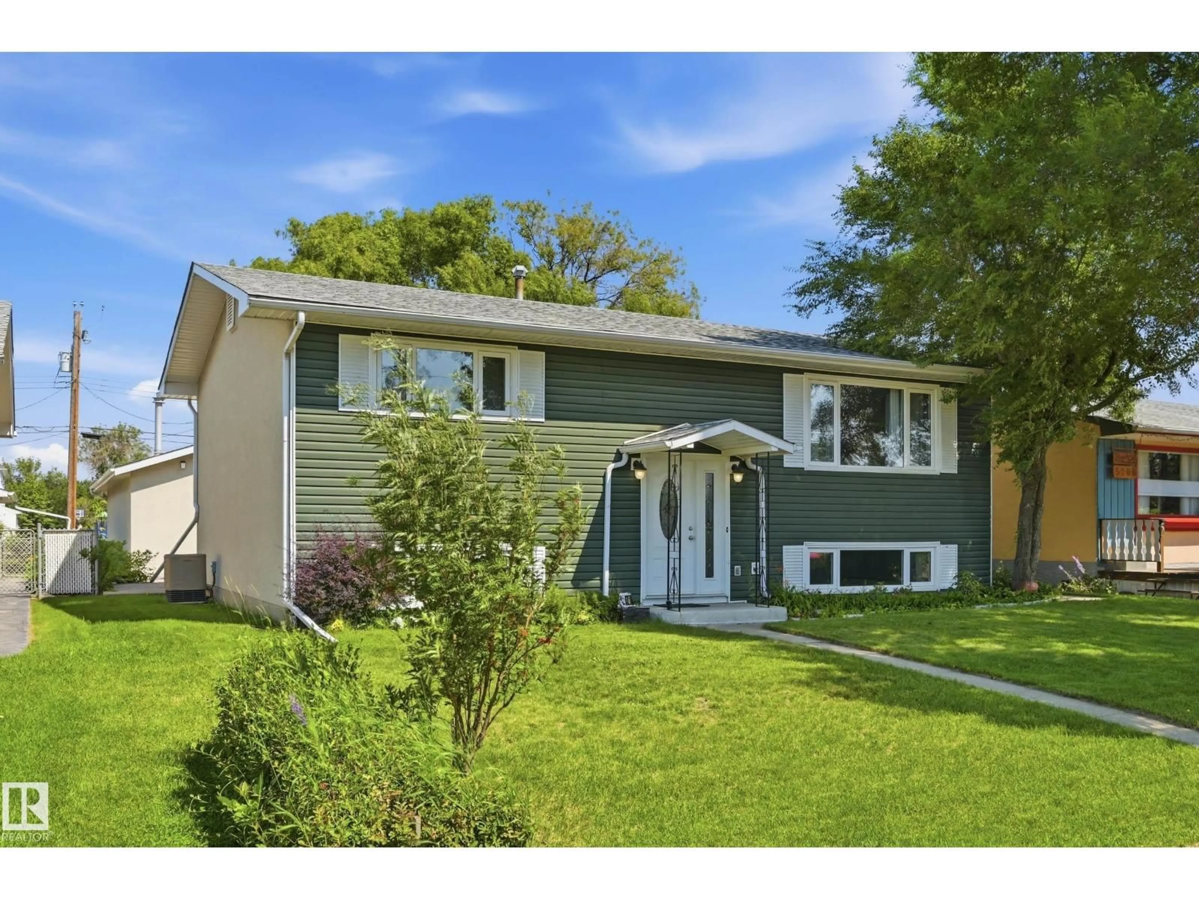 Home with vinyl exterior material, street for 5210 43 AV, Leduc Alberta T9E5A6