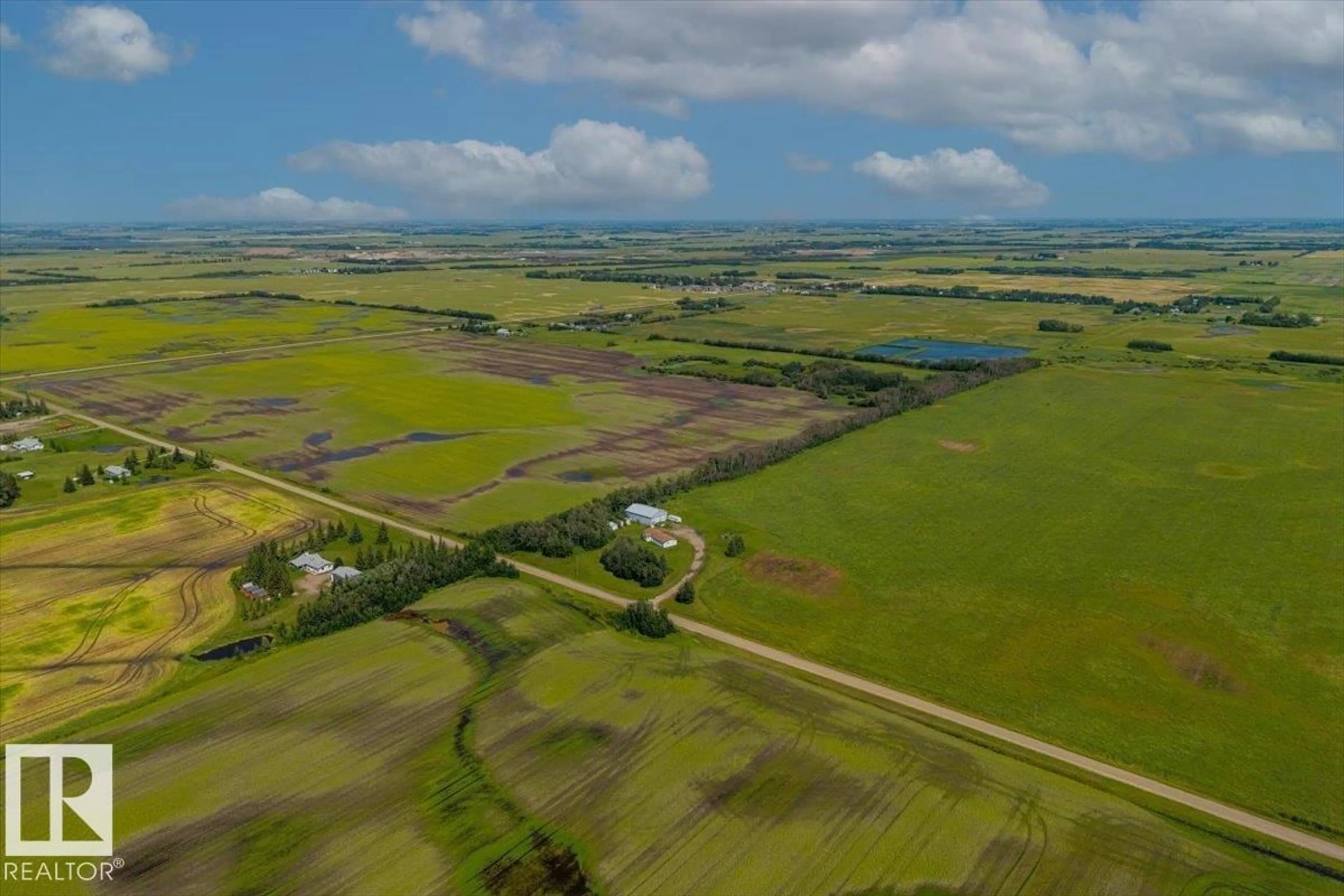 A pic from outside/outdoor area/front of a property/back of a property/a pic from drone, water/lake/river/ocean view for 54115 RANGE ROAD 270, Rural Sturgeon County Alberta T8T1G5