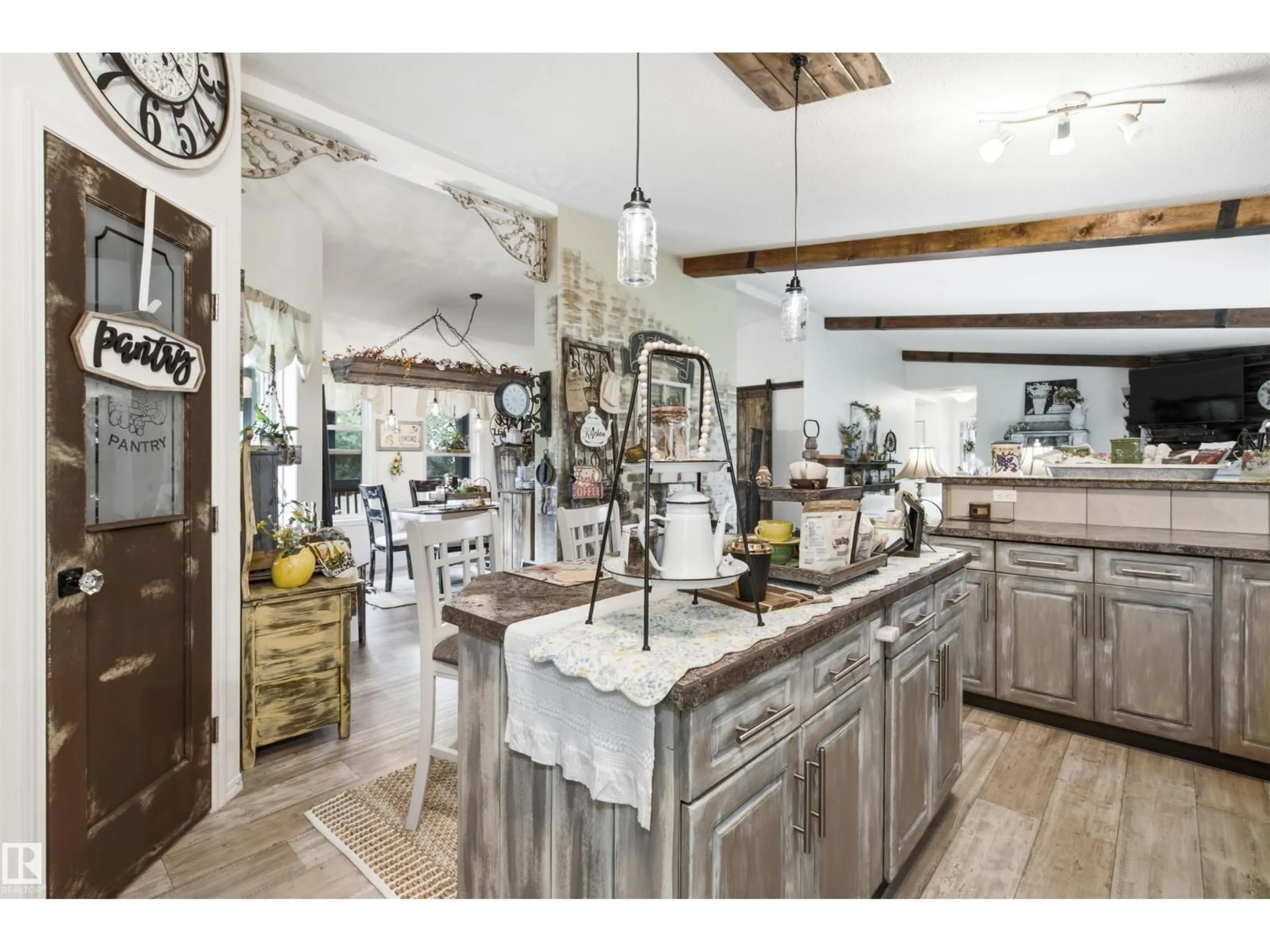 Open concept kitchen, ceramic/tile floor for 59526 - 116 HWY 657, Rural Bonnyville M.D. Alberta T9N2G3