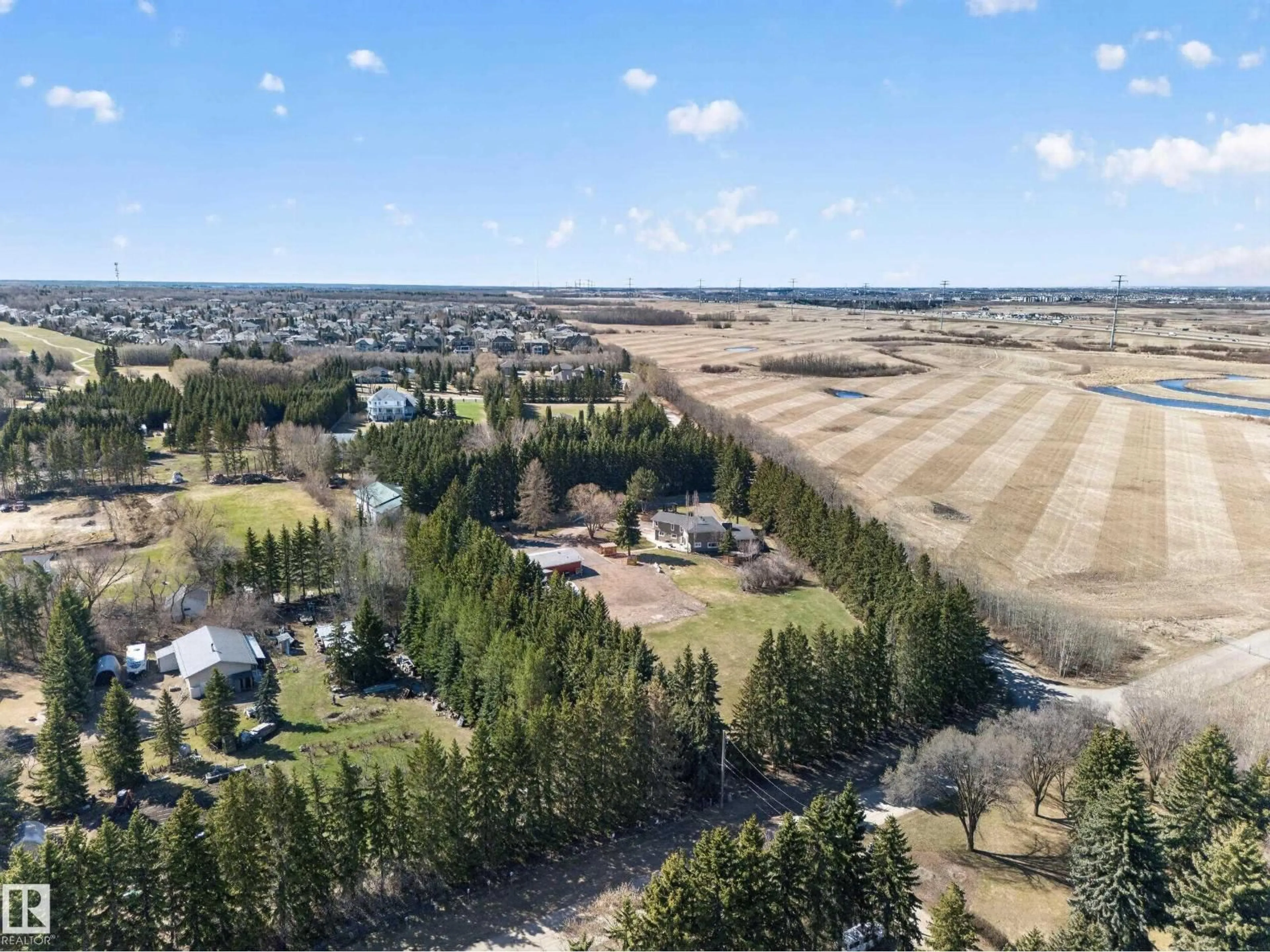 A pic from outside/outdoor area/front of a property/back of a property/a pic from drone, forest/trees view for 23333 WYE RD, Rural Strathcona County Alberta T8B1K4
