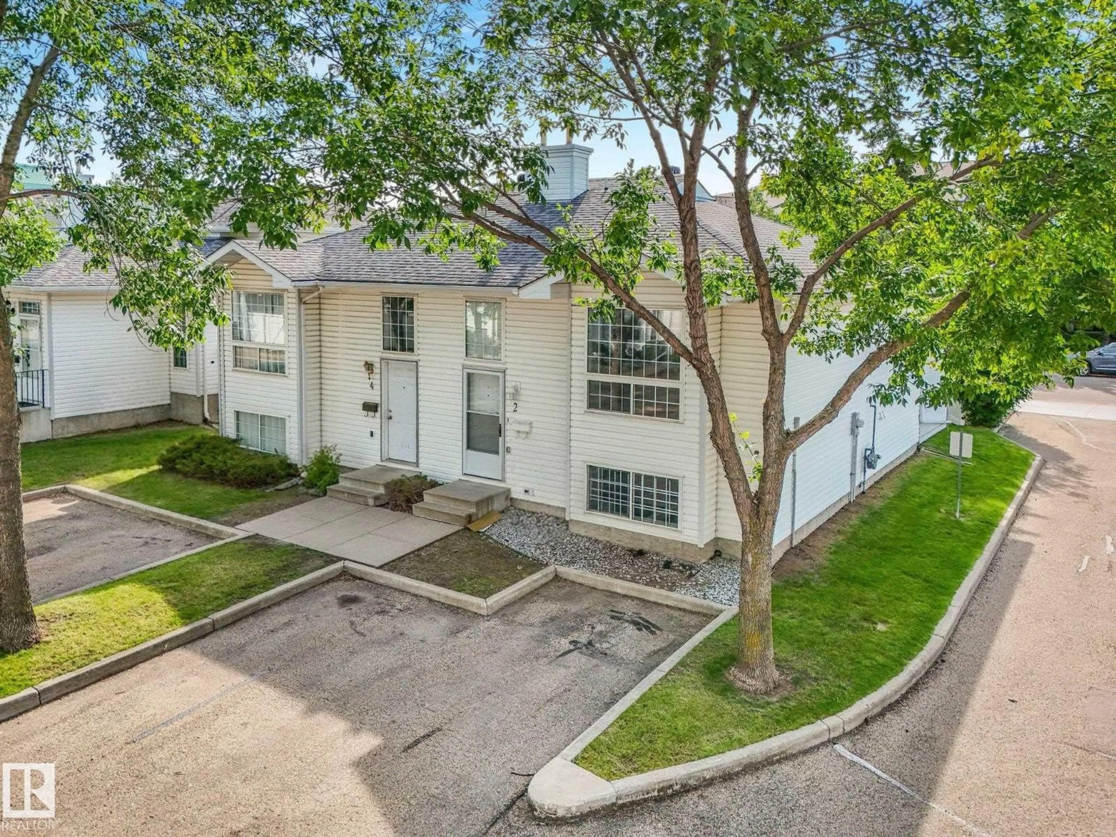 A pic from outside/outdoor area/front of a property/back of a property/a pic from drone, street for #2 - 3311 58 ST, Edmonton Alberta T6L6X3