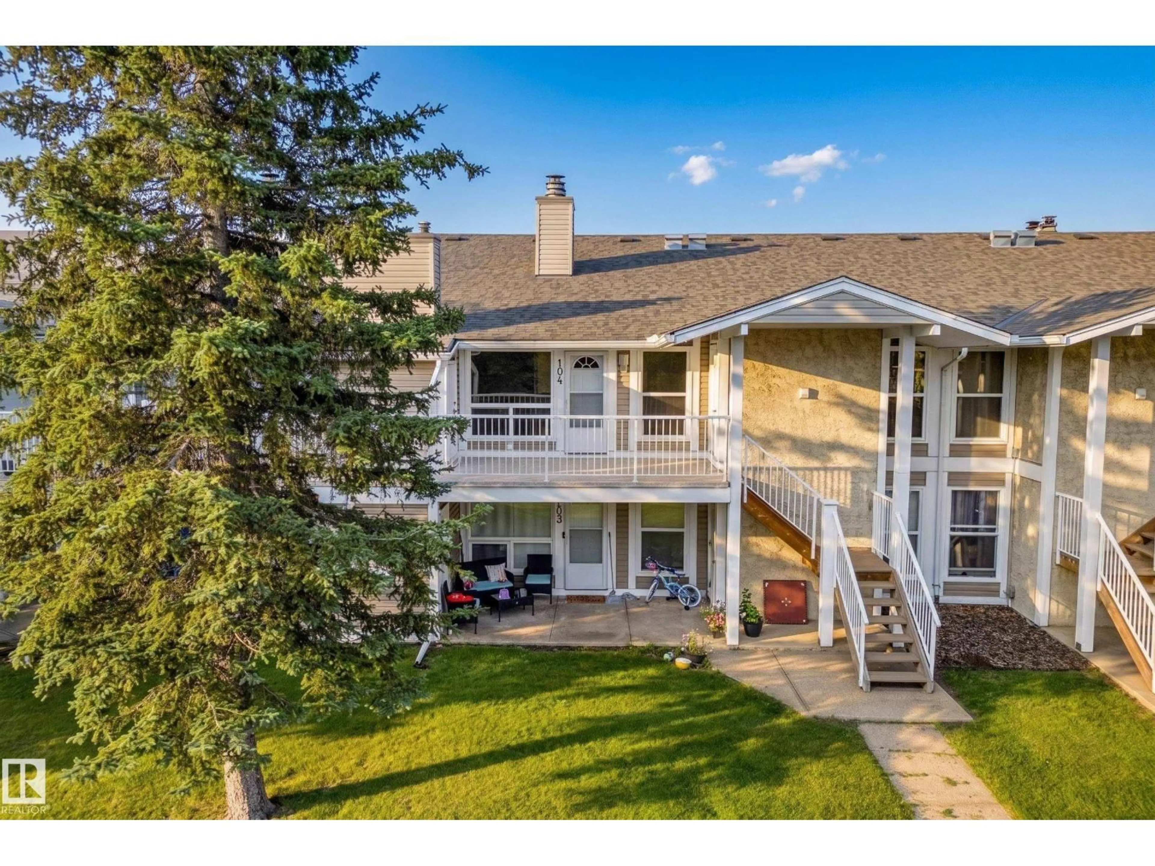 A pic from outside/outdoor area/front of a property/back of a property/a pic from drone, mountain view for #104 - 2204 118 ST, Edmonton Alberta T6J5K2