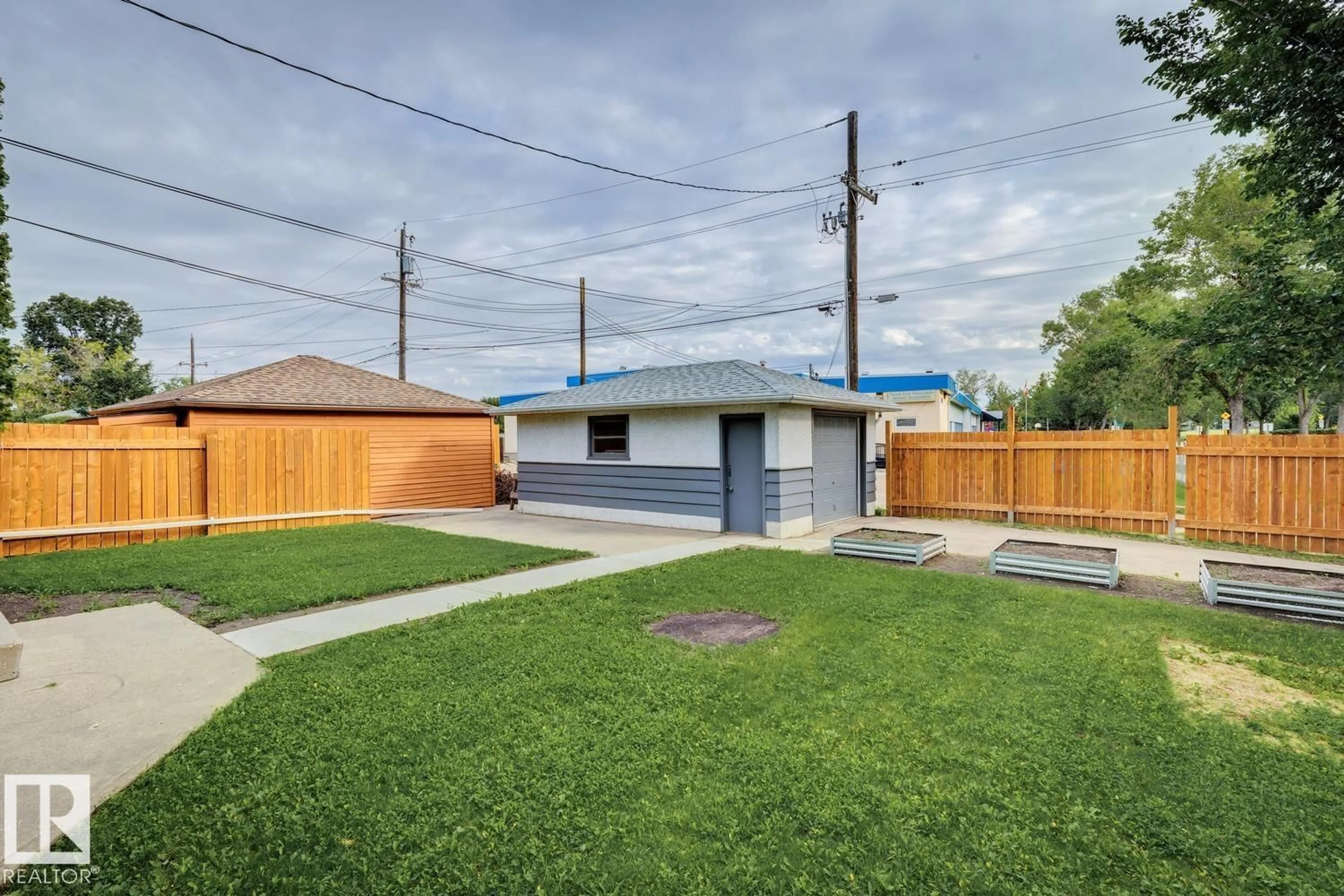 A pic from outside/outdoor area/front of a property/back of a property/a pic from drone, street for 8202 93A AV, Edmonton Alberta T6C1V6