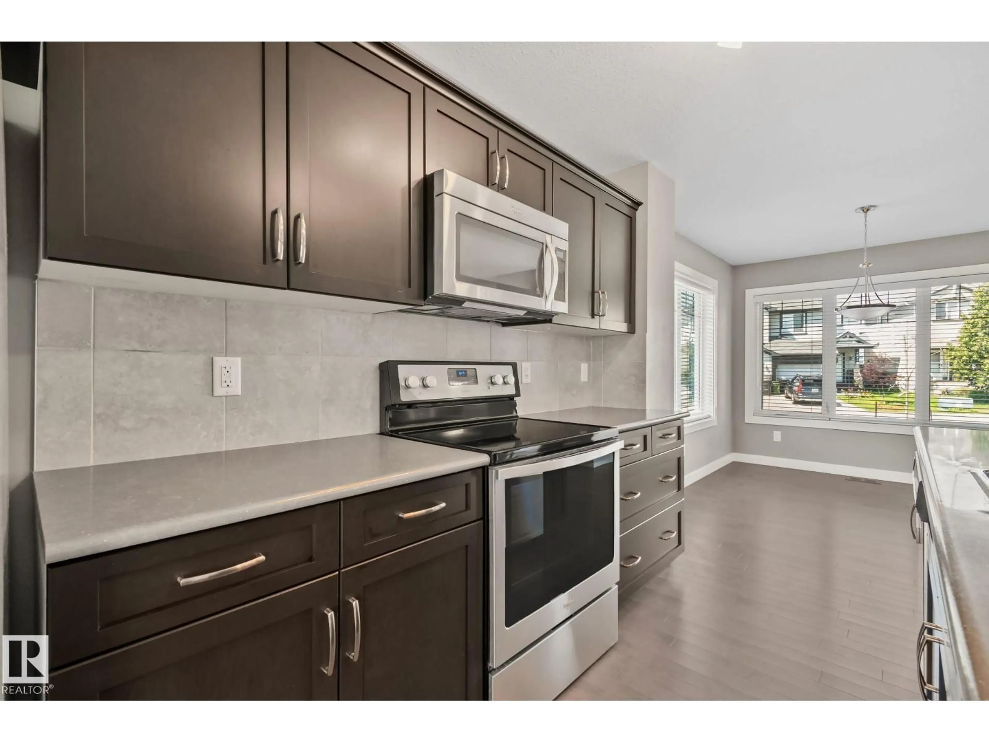 Standard kitchen, ceramic/tile floor for 16715 40 ST, Edmonton Alberta T5Y0X9