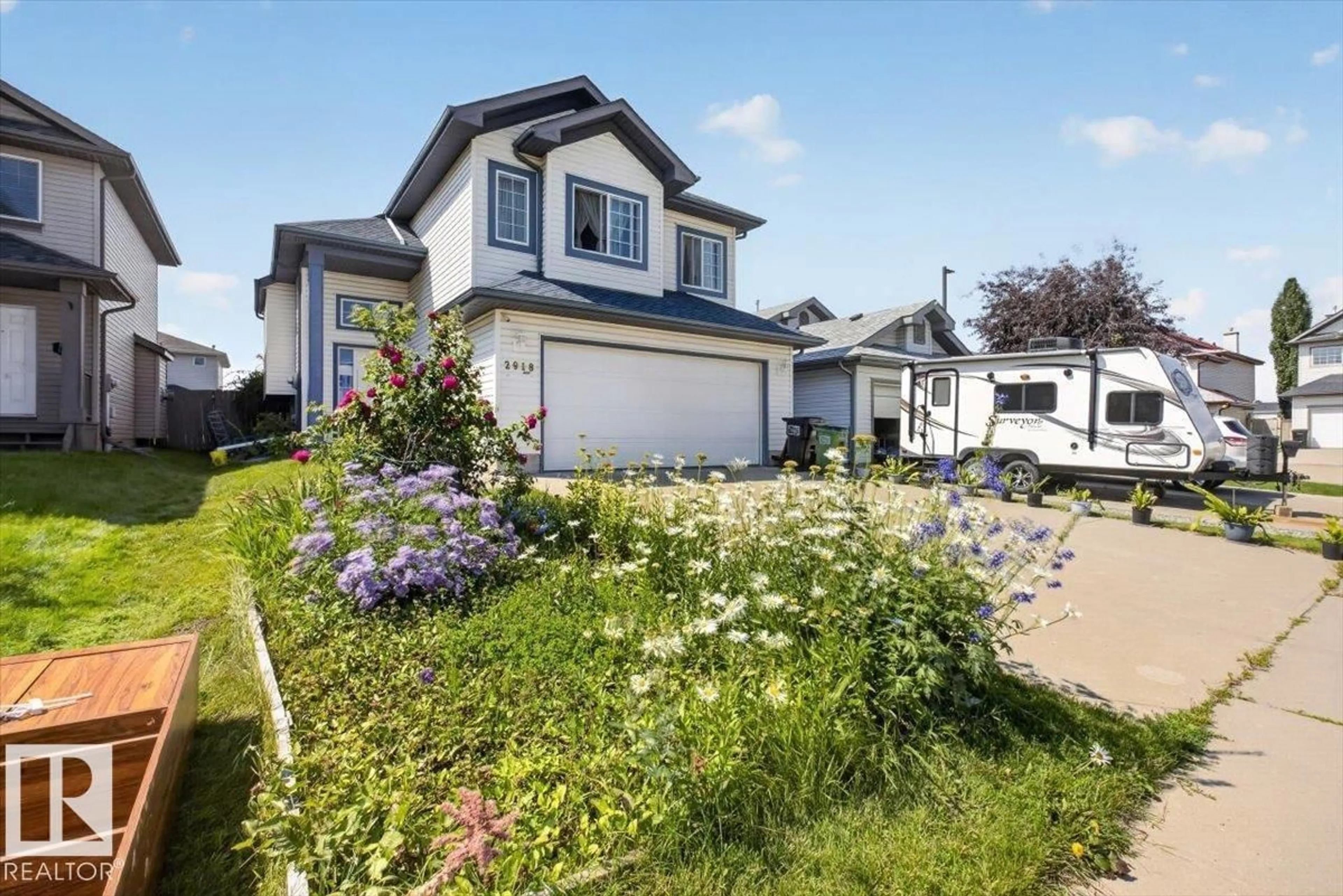 Home with vinyl exterior material, street for NW - 2918 33 ST, Edmonton Alberta T6T1V6