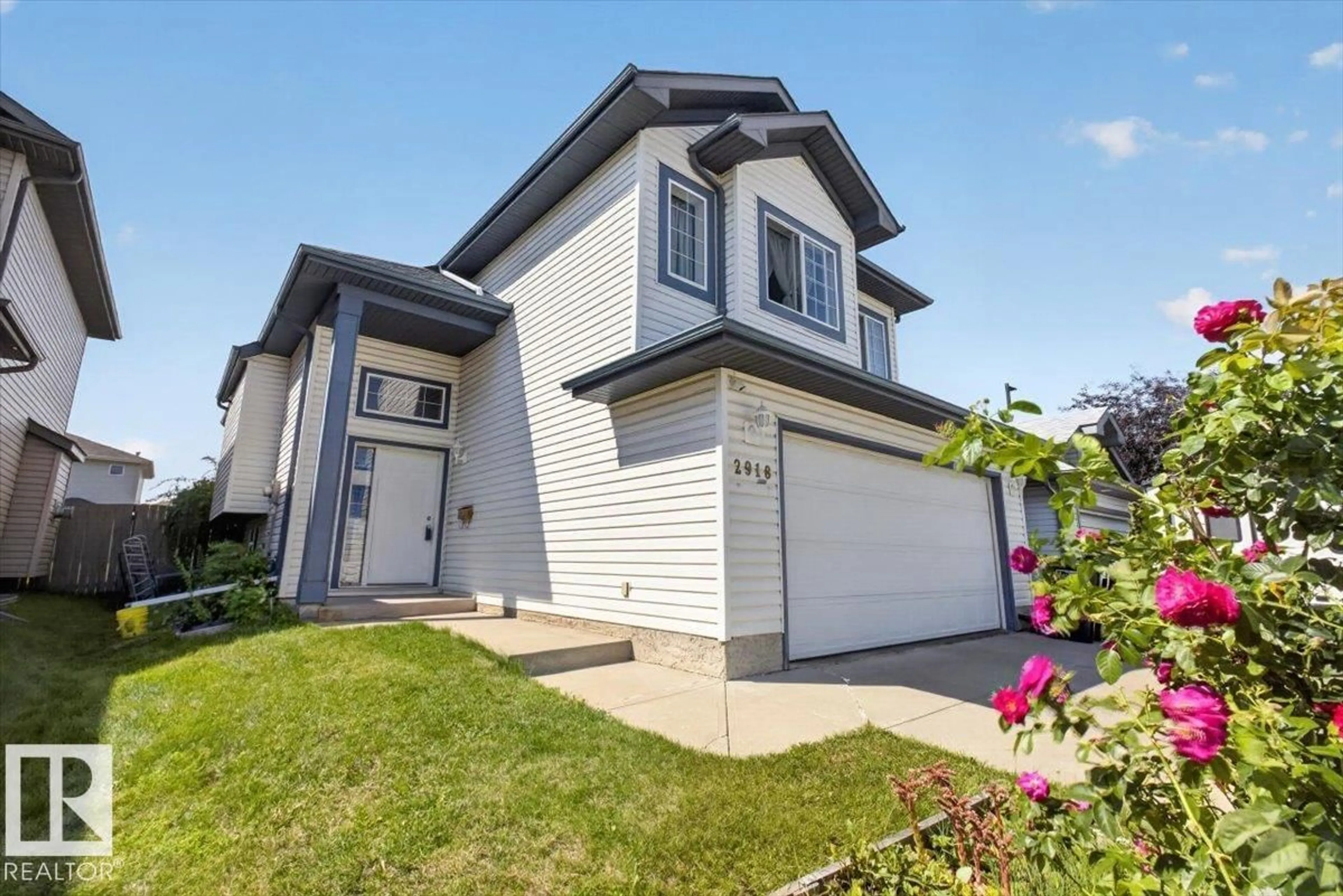 Home with vinyl exterior material, street for NW - 2918 33 ST, Edmonton Alberta T6T1V6
