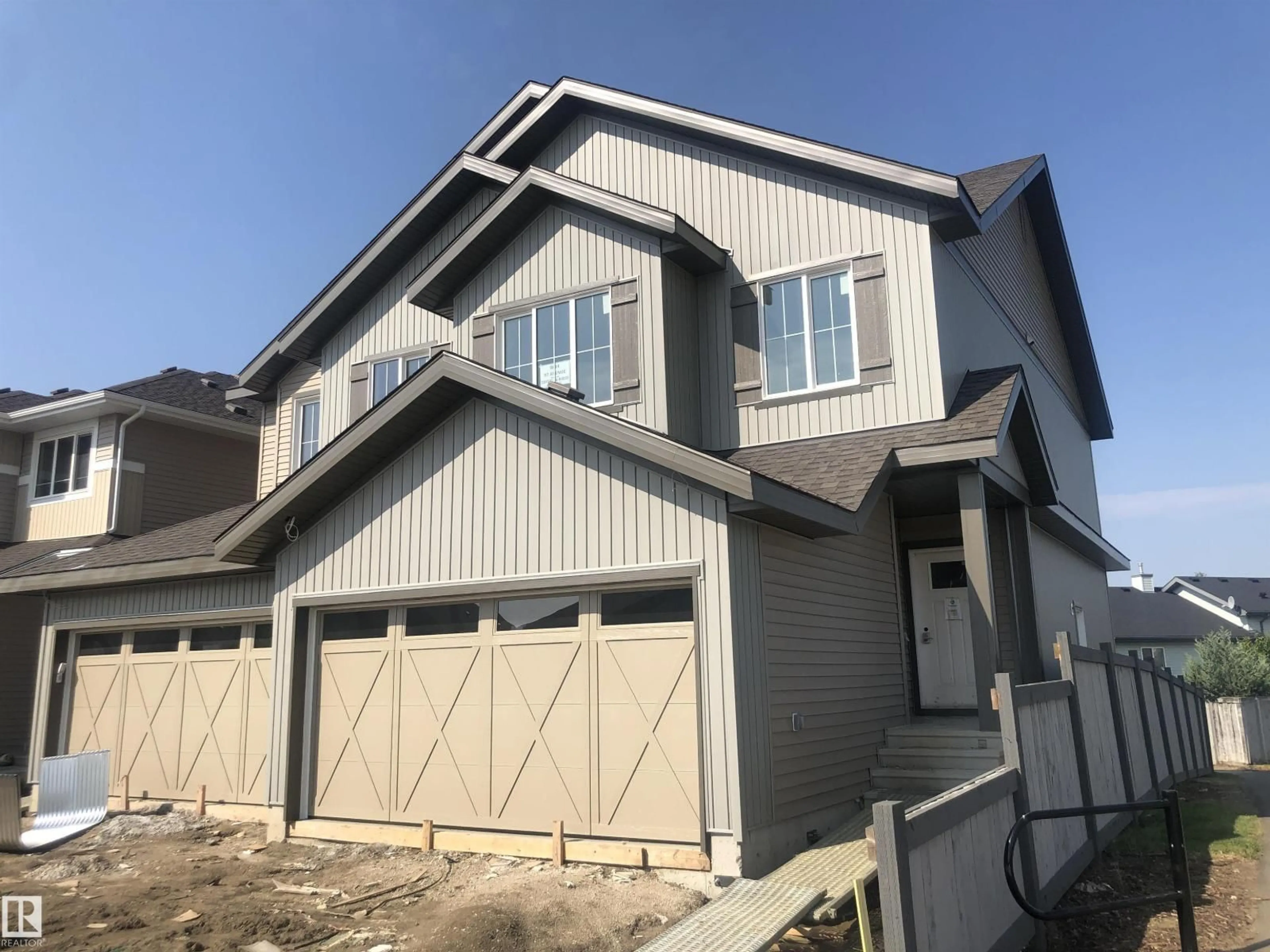 Home with vinyl exterior material, street for 8614 97 AV, Morinville Alberta T8R2S1