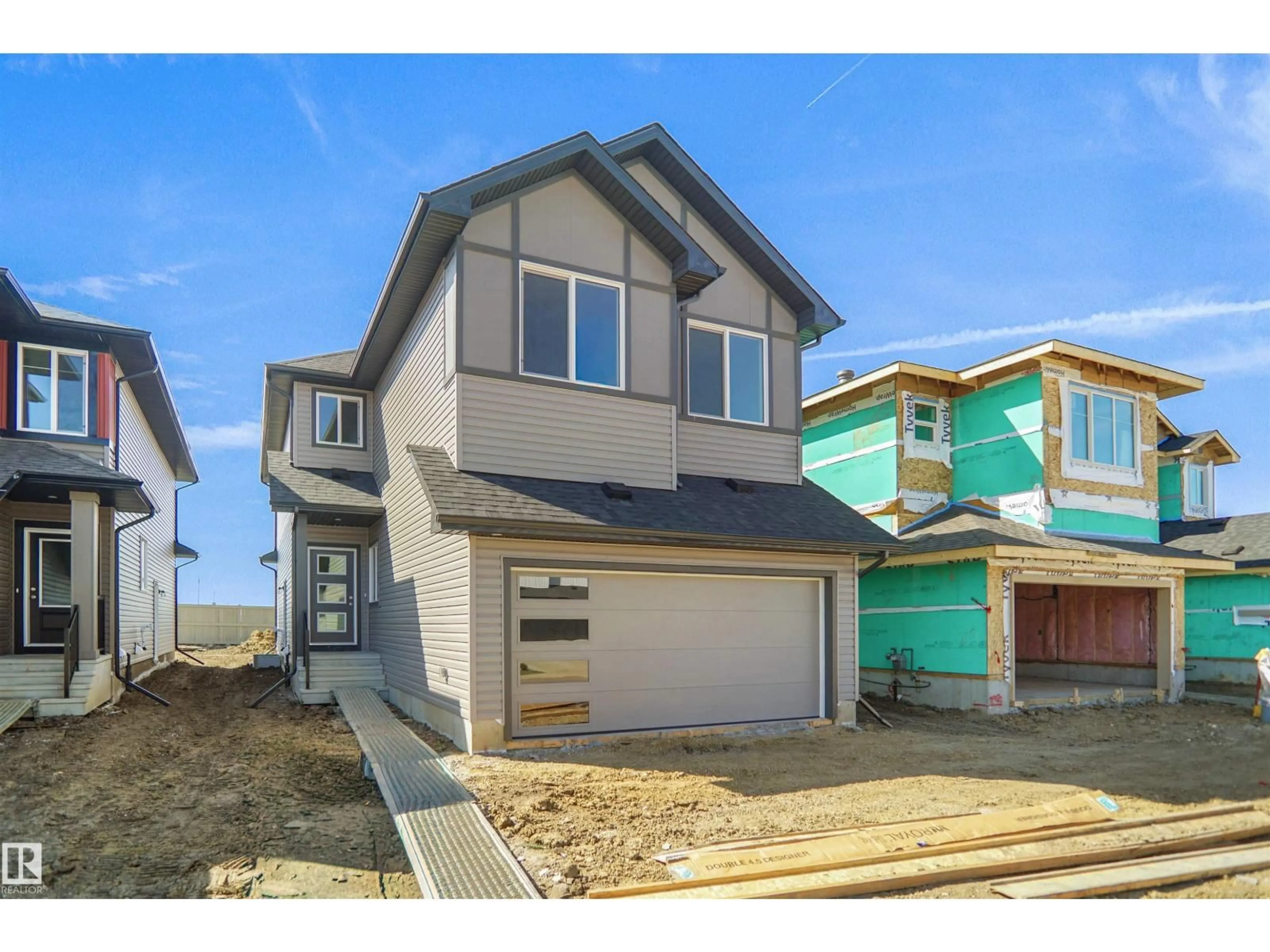 Home with vinyl exterior material, street for 7239 182 AV, Edmonton Alberta T5Z0V6
