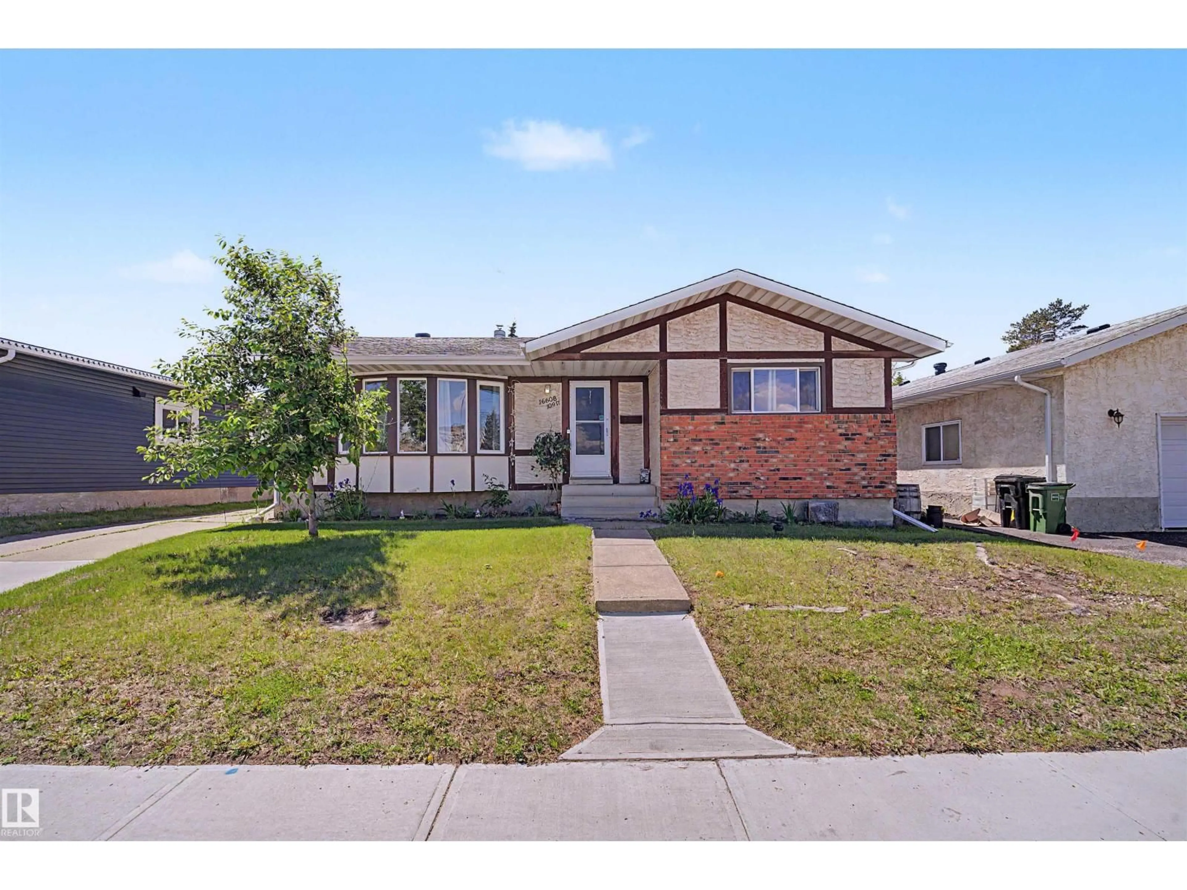 Home with brick exterior material, street for 16608 109 ST, Edmonton Alberta T5X1W9