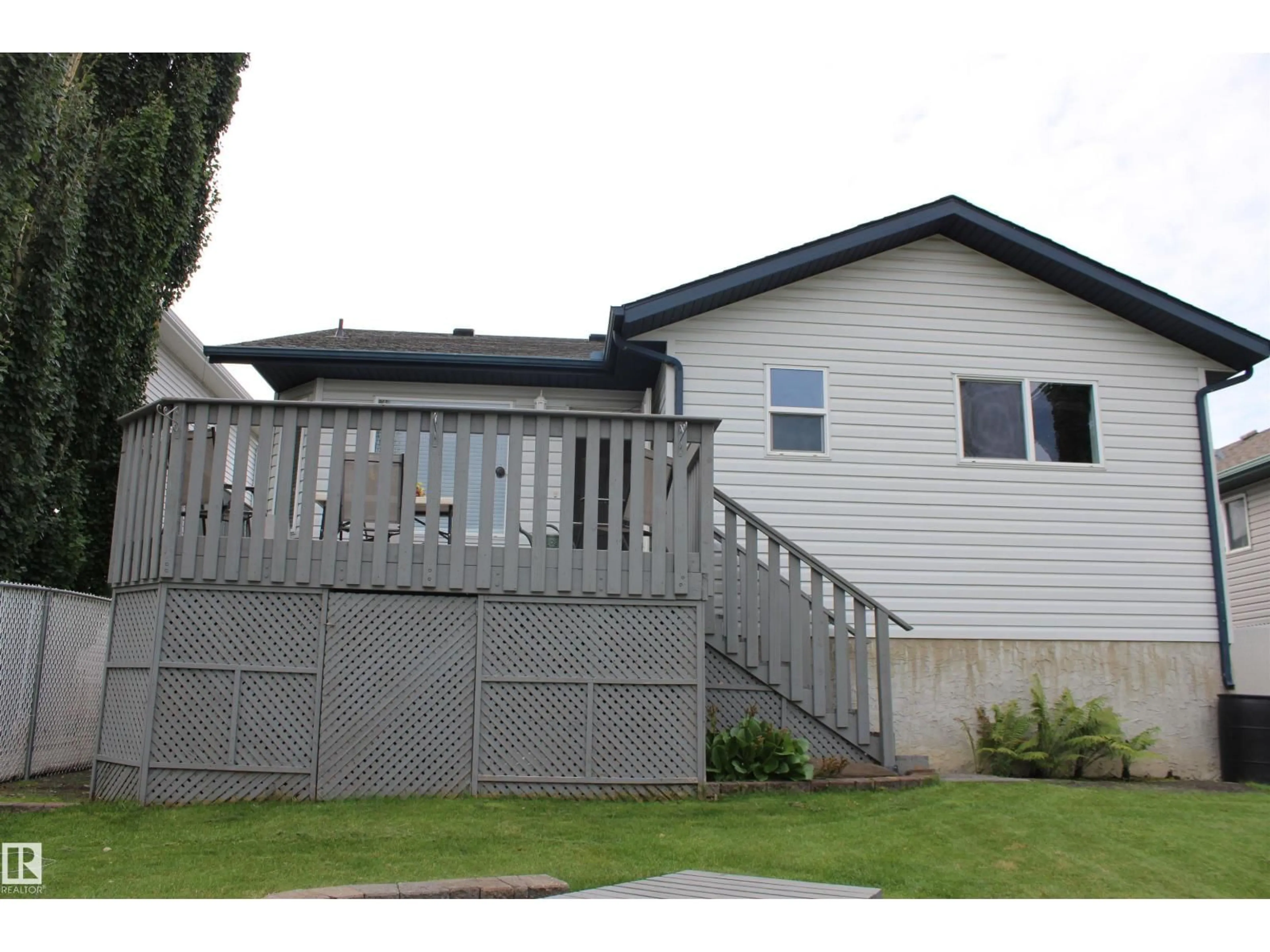 Home with vinyl exterior material, street for 64 CREEKSIDE WY, Spruce Grove Alberta T7X4A2