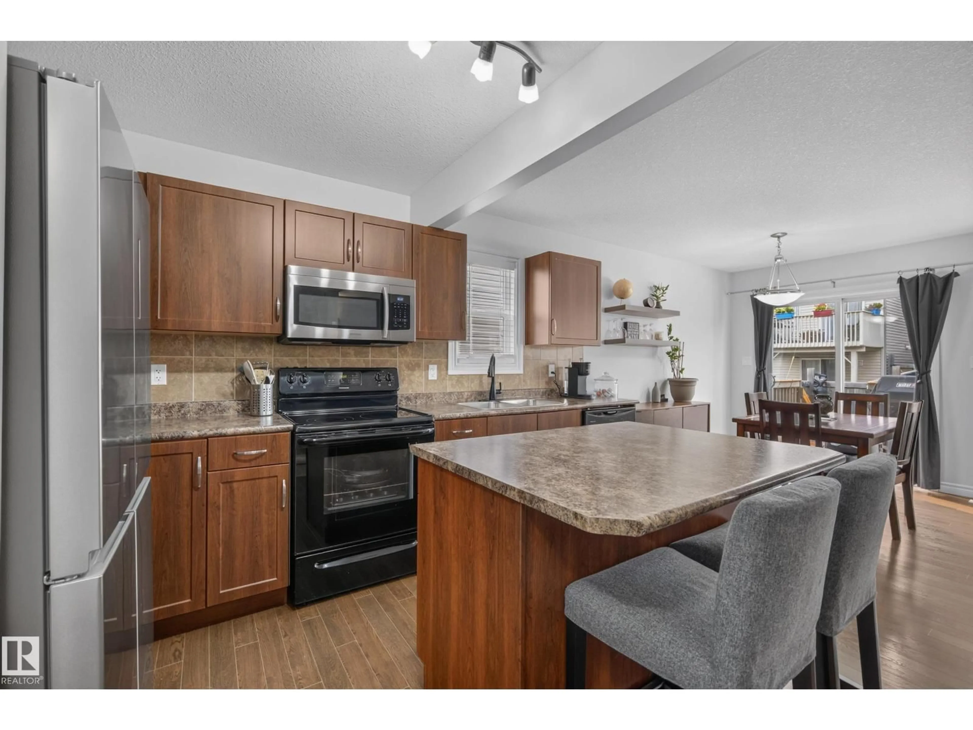 Open concept kitchen, ceramic/tile floor for 10 85 SPRUCE VILLAGE DR, Spruce Grove Alberta T7X0L2