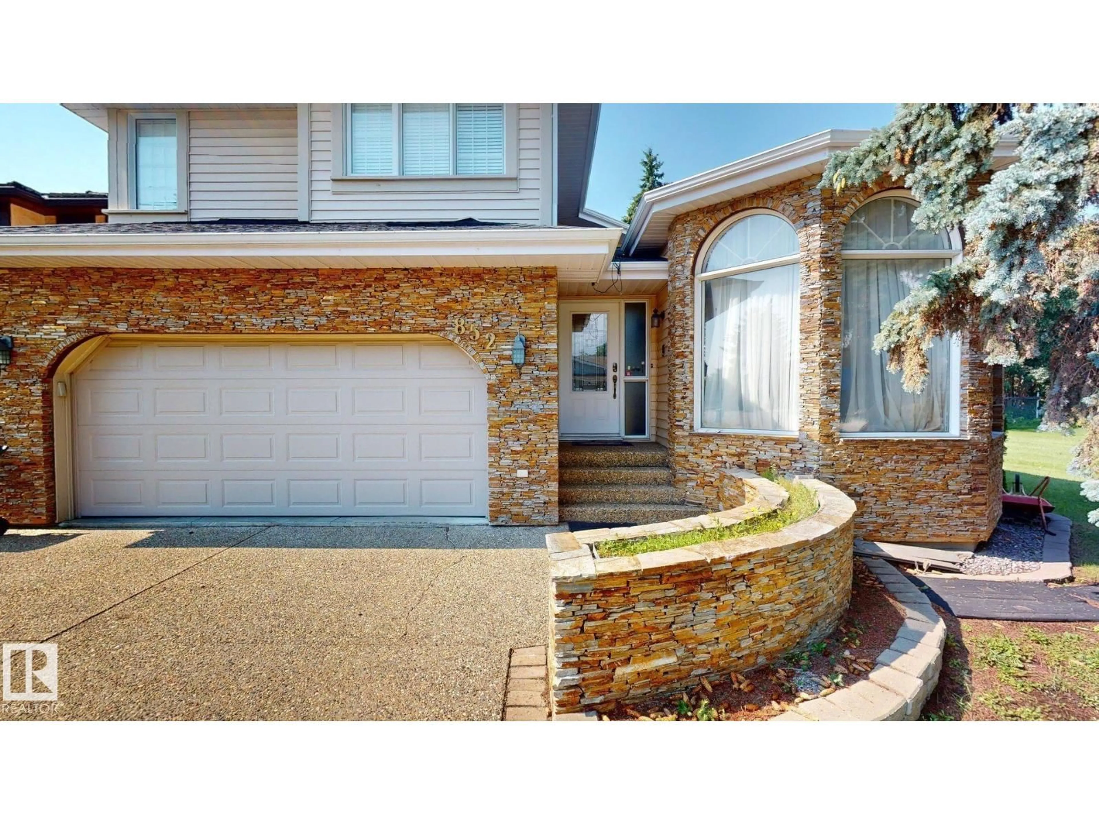 Home with brick exterior material, street for W NW - 852 WHEELER RD, Edmonton Alberta T6M2E1
