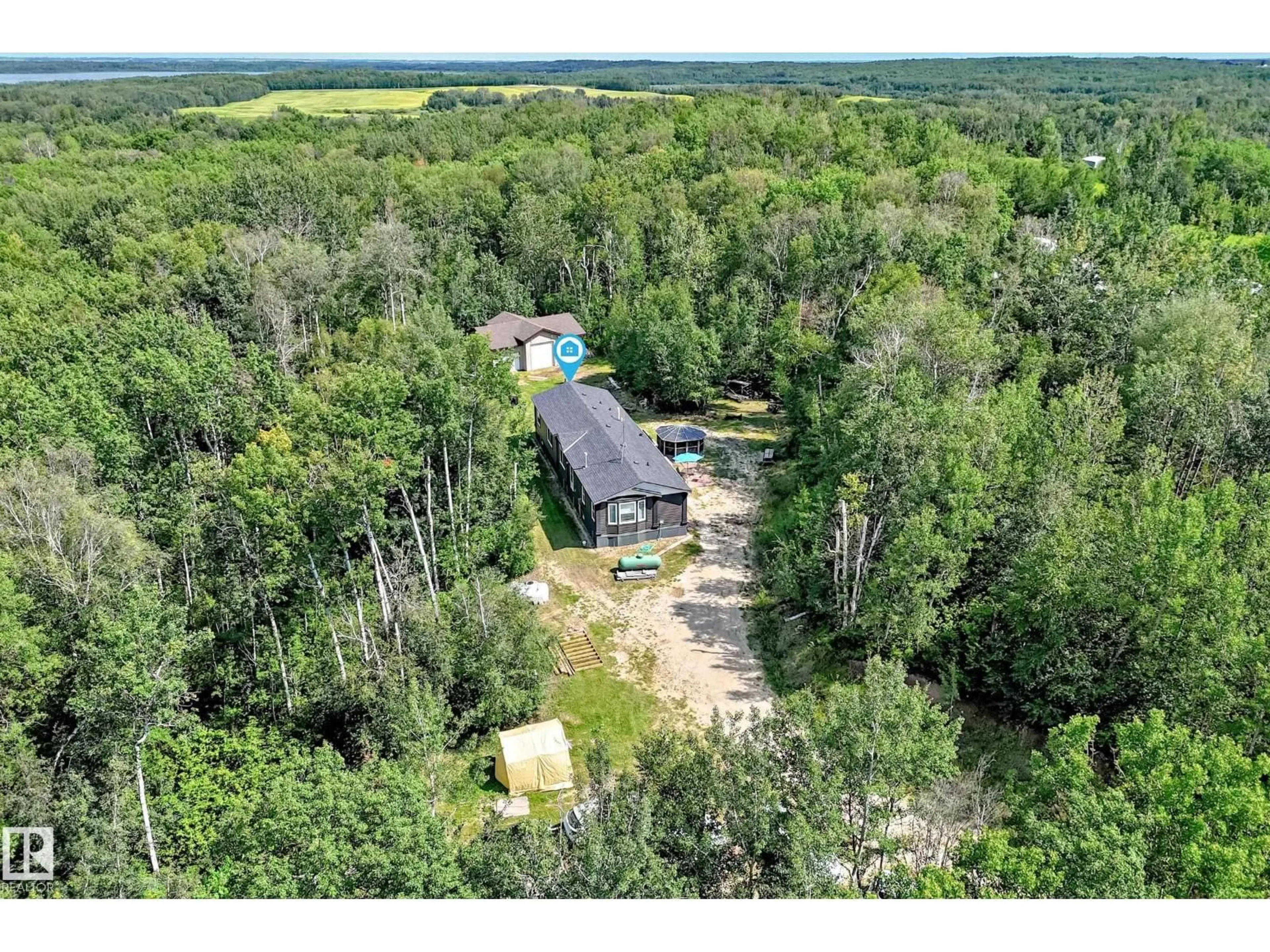 A pic from outside/outdoor area/front of a property/back of a property/a pic from drone, forest/trees view for 30 55220 RGE ROAD 13, Rural Lac Ste. Anne County Alberta T5R2R6