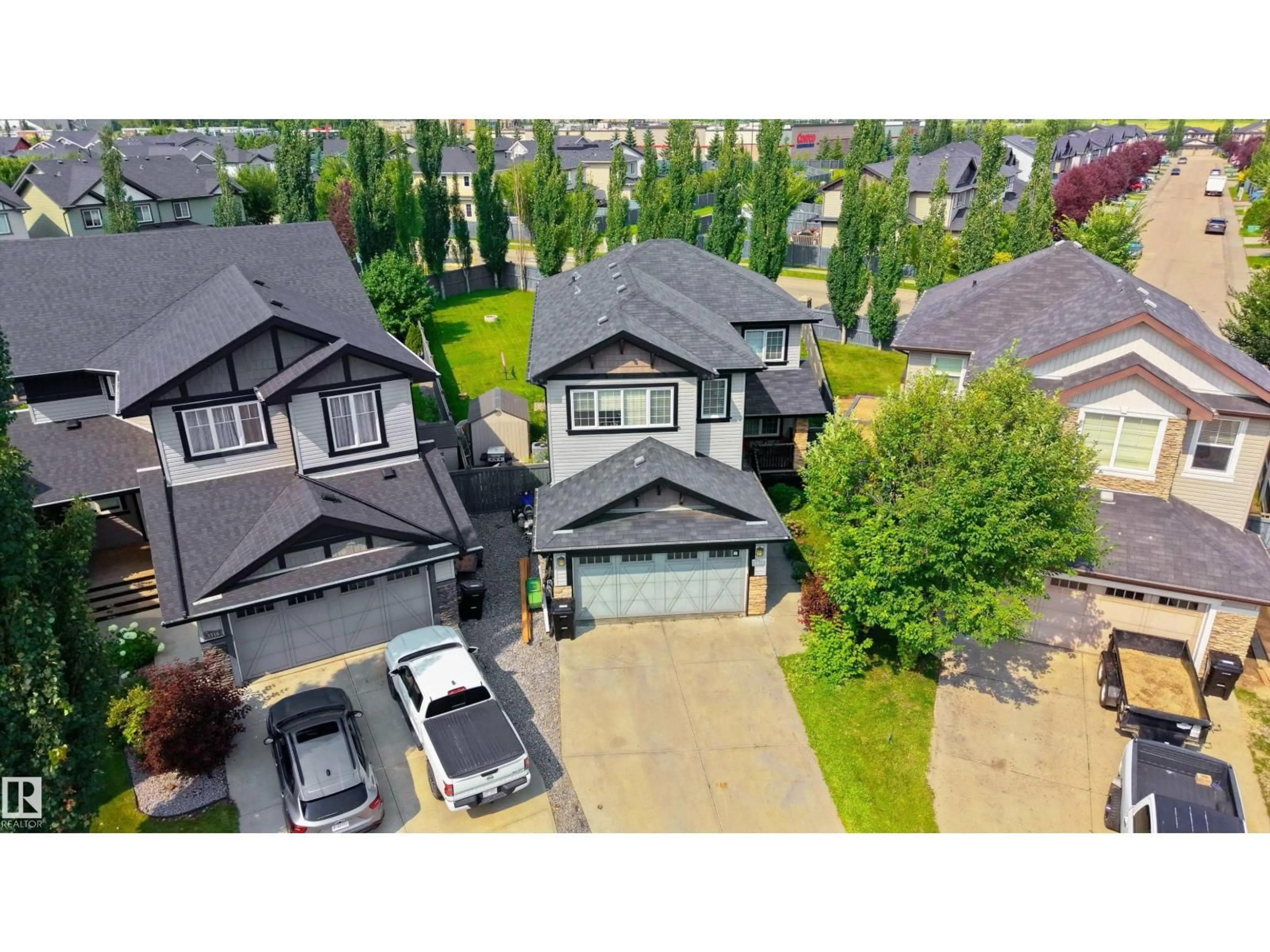 A pic from outside/outdoor area/front of a property/back of a property/a pic from drone, street for 3514 GOODRIDGE BA, Edmonton Alberta T5T4C6