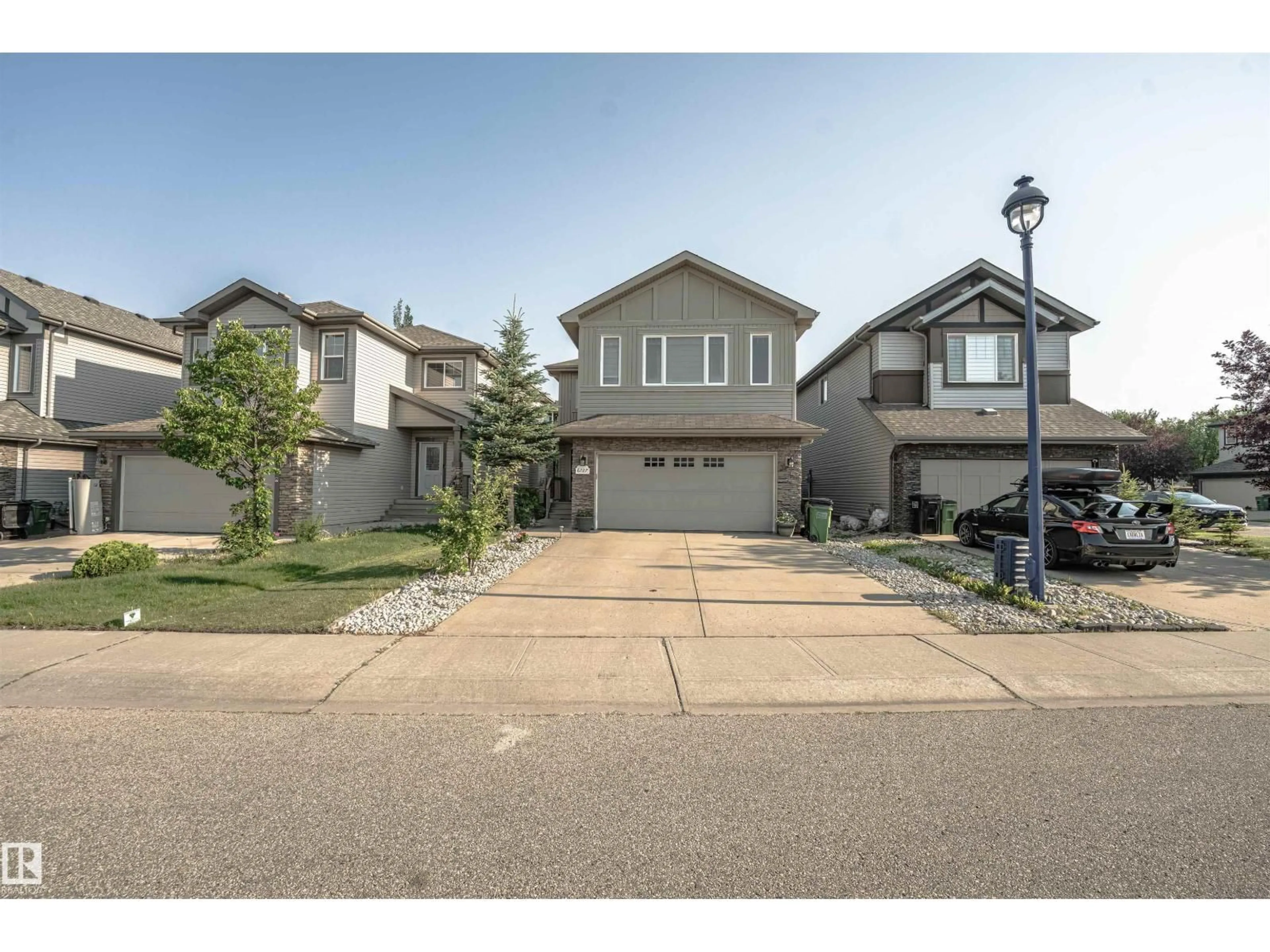 A pic from outside/outdoor area/front of a property/back of a property/a pic from drone, street for SW - 6727 20 AVE, Edmonton Alberta T6X0T4