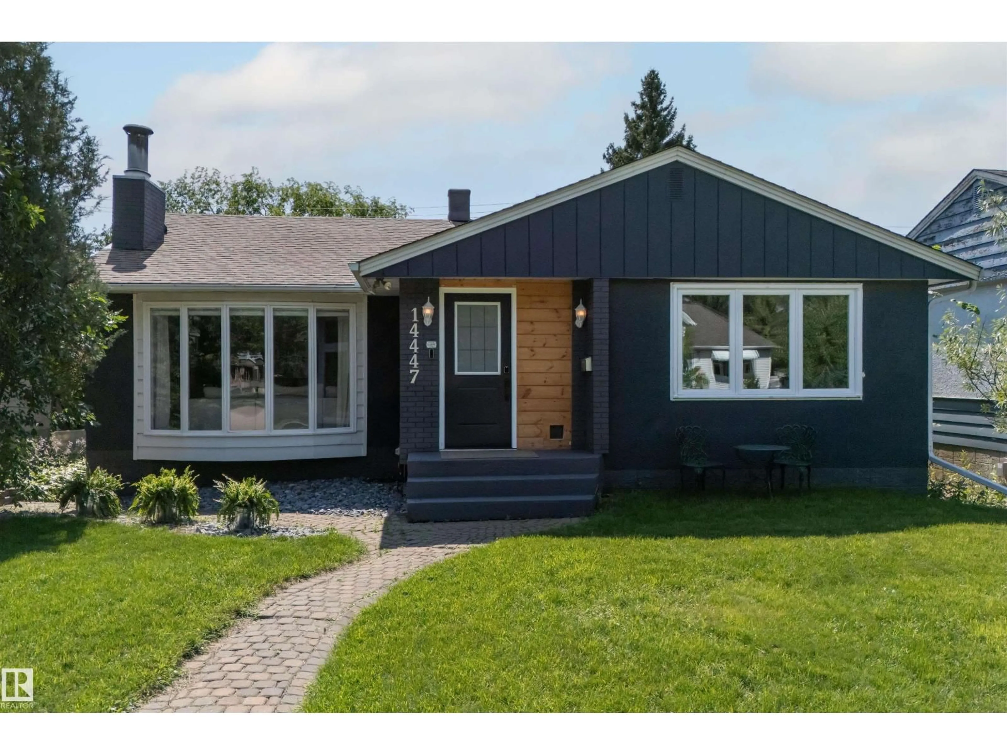 Home with vinyl exterior material, street for 14447 107A AV, Edmonton Alberta T5N1G3