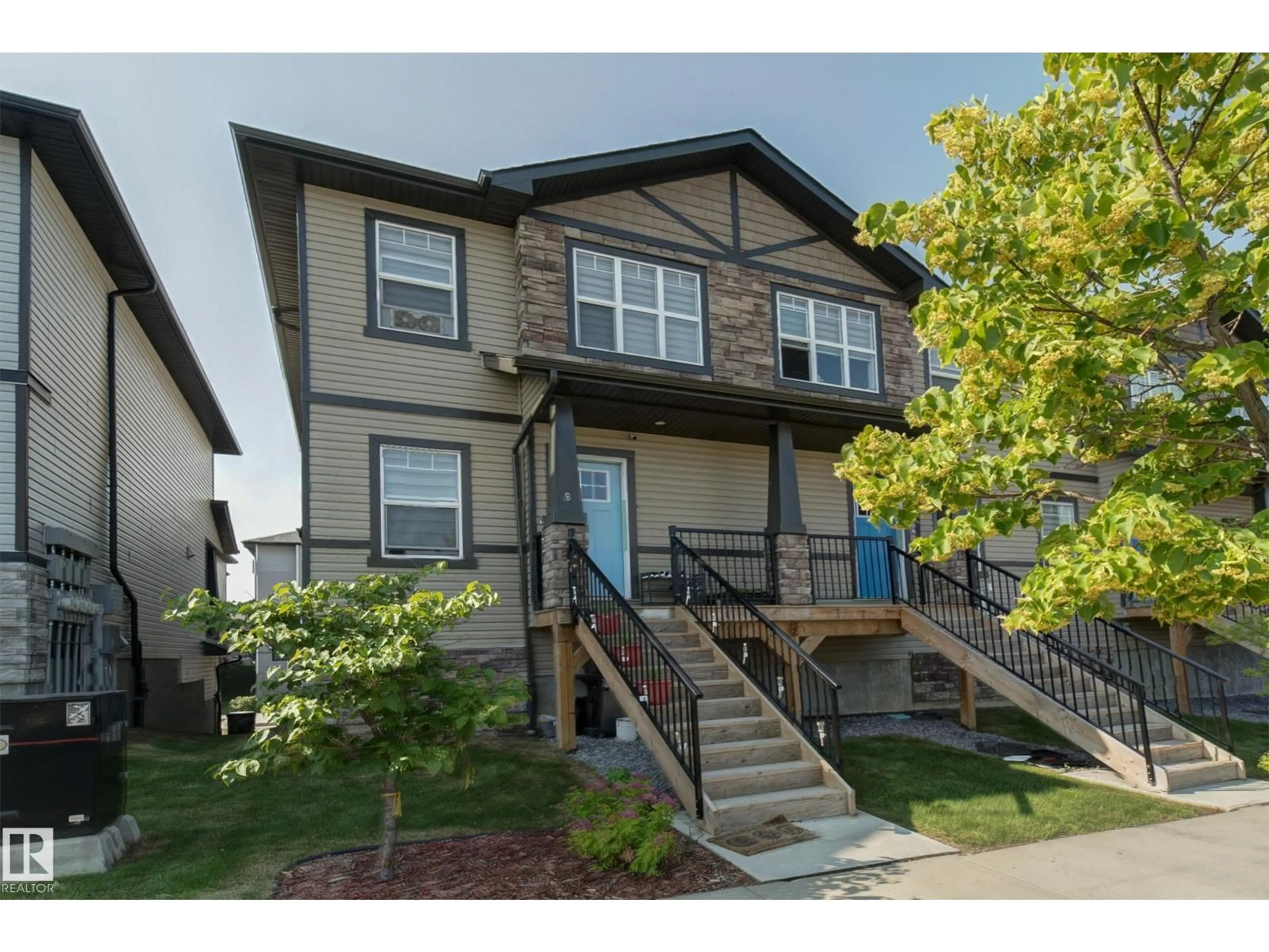 Home with vinyl exterior material, street for #8 - 1703 16 AV, Edmonton Alberta T6T2C3