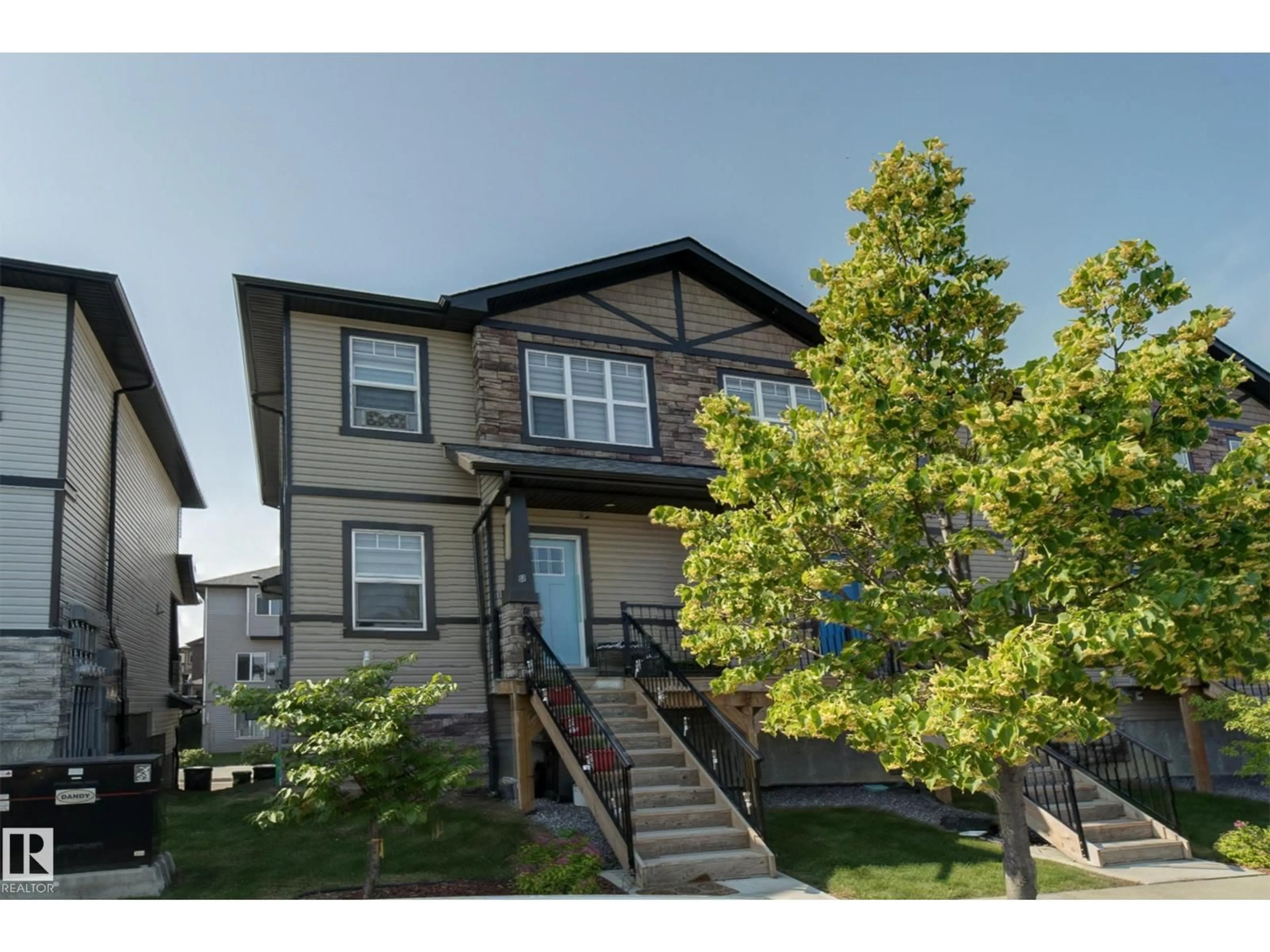 Home with vinyl exterior material, street for #8 - 1703 16 AV, Edmonton Alberta T6T2C3