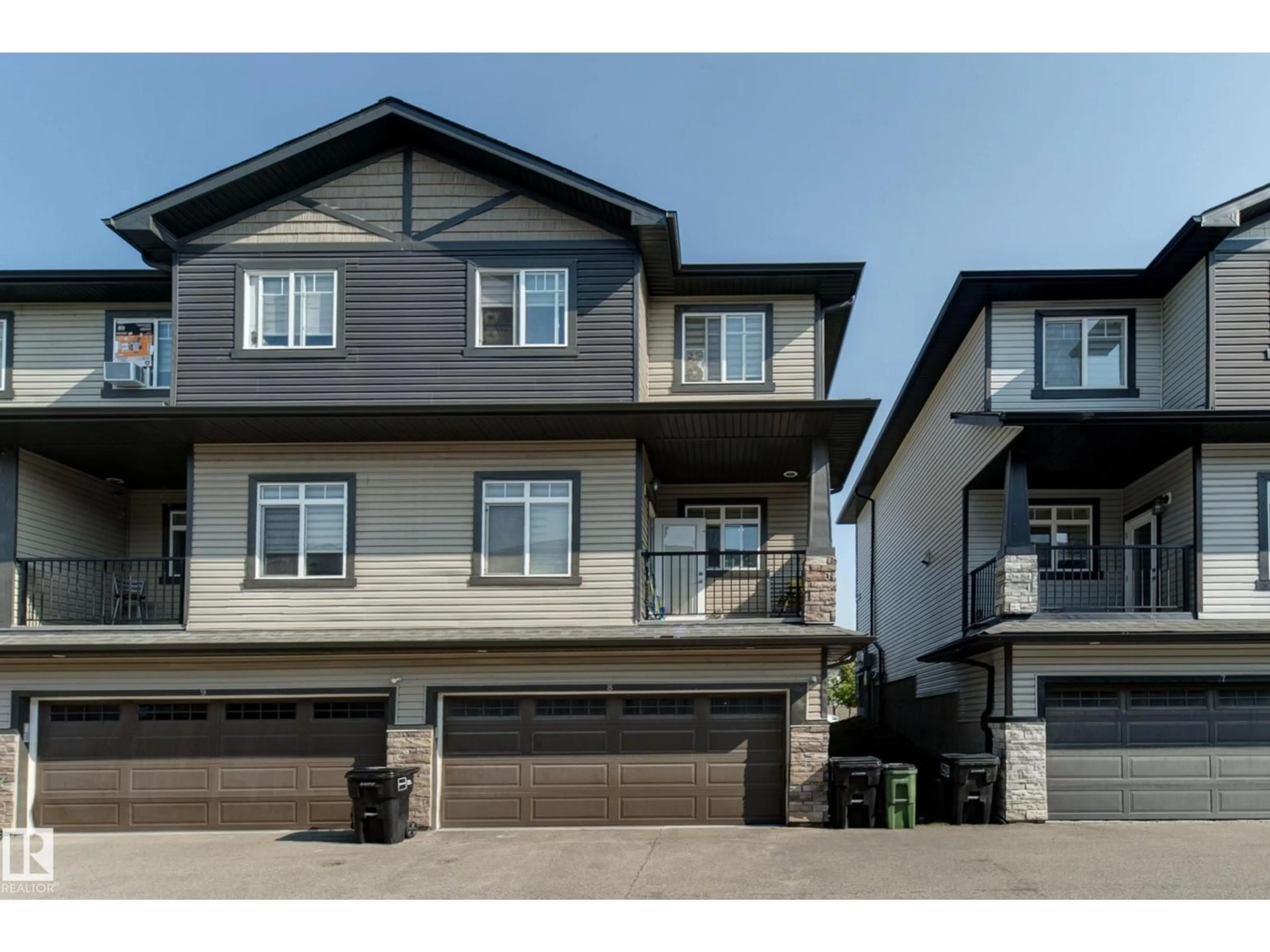 Home with vinyl exterior material, street for #8 - 1703 16 AV, Edmonton Alberta T6T2C3