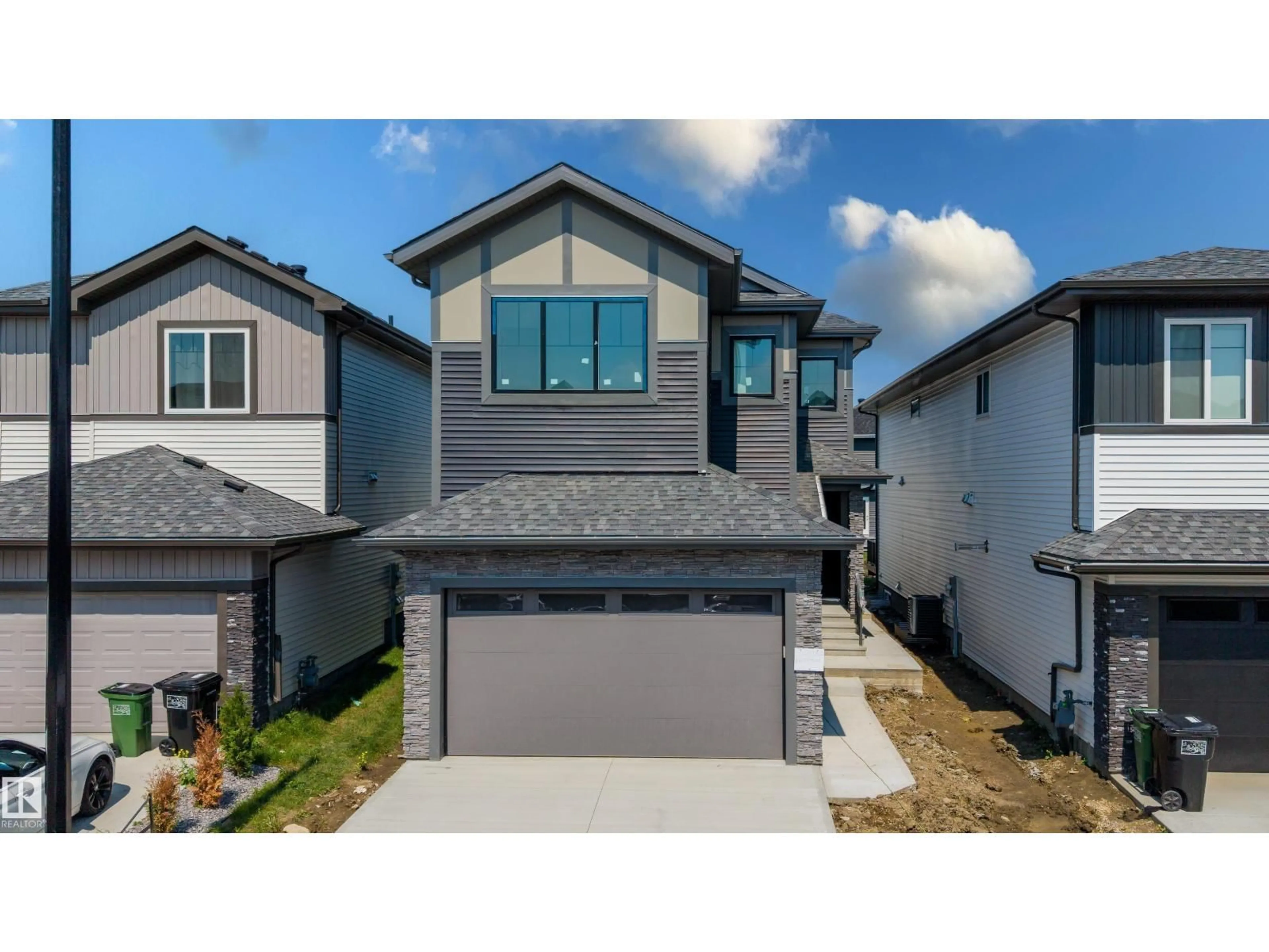 A pic from outside/outdoor area/front of a property/back of a property/a pic from drone, street for NW - 8728 182 AV, Edmonton Alberta T5Z2K6