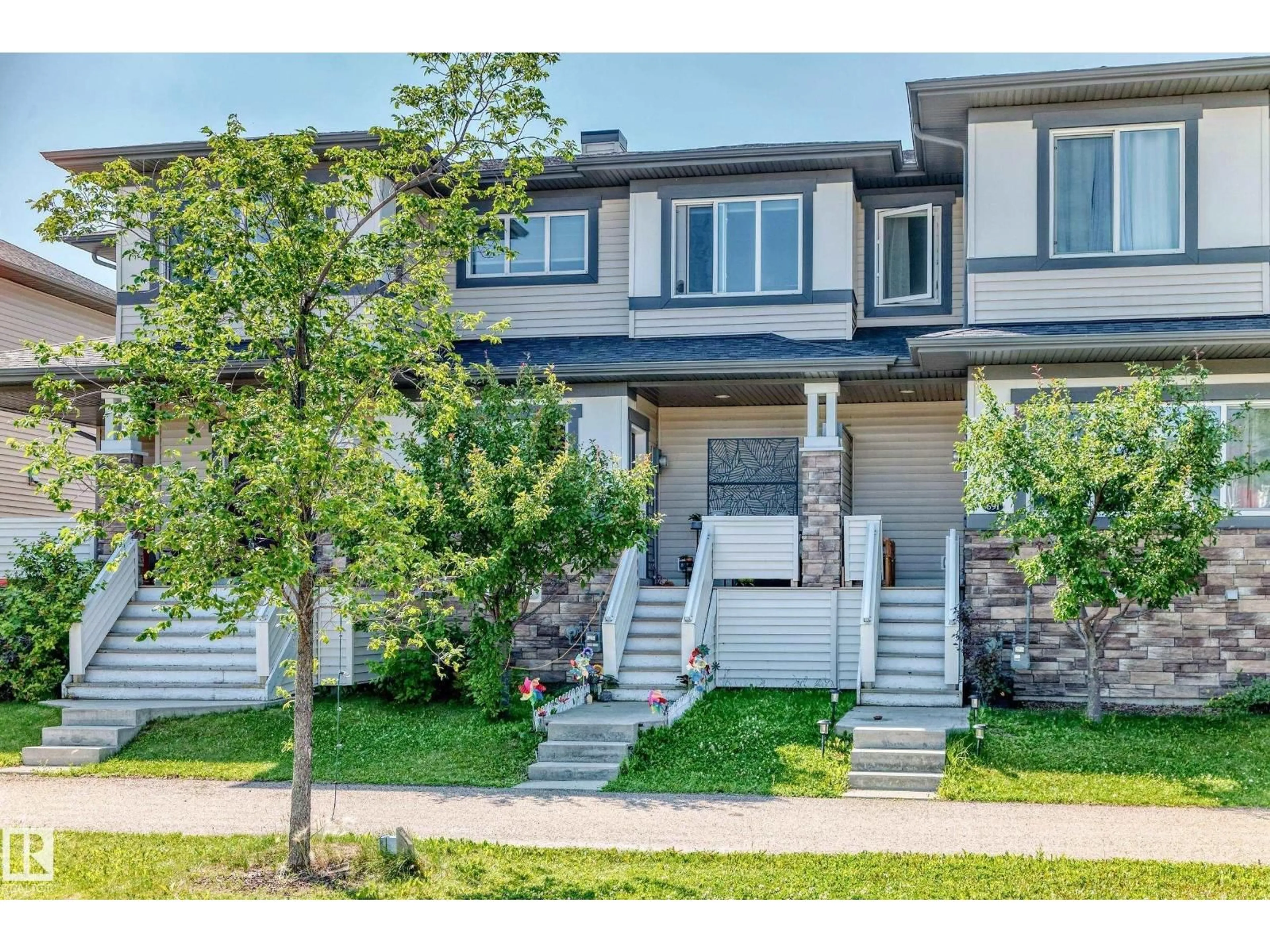 Home with vinyl exterior material, street for 689 BLACK BV, Leduc Alberta T9E1H1