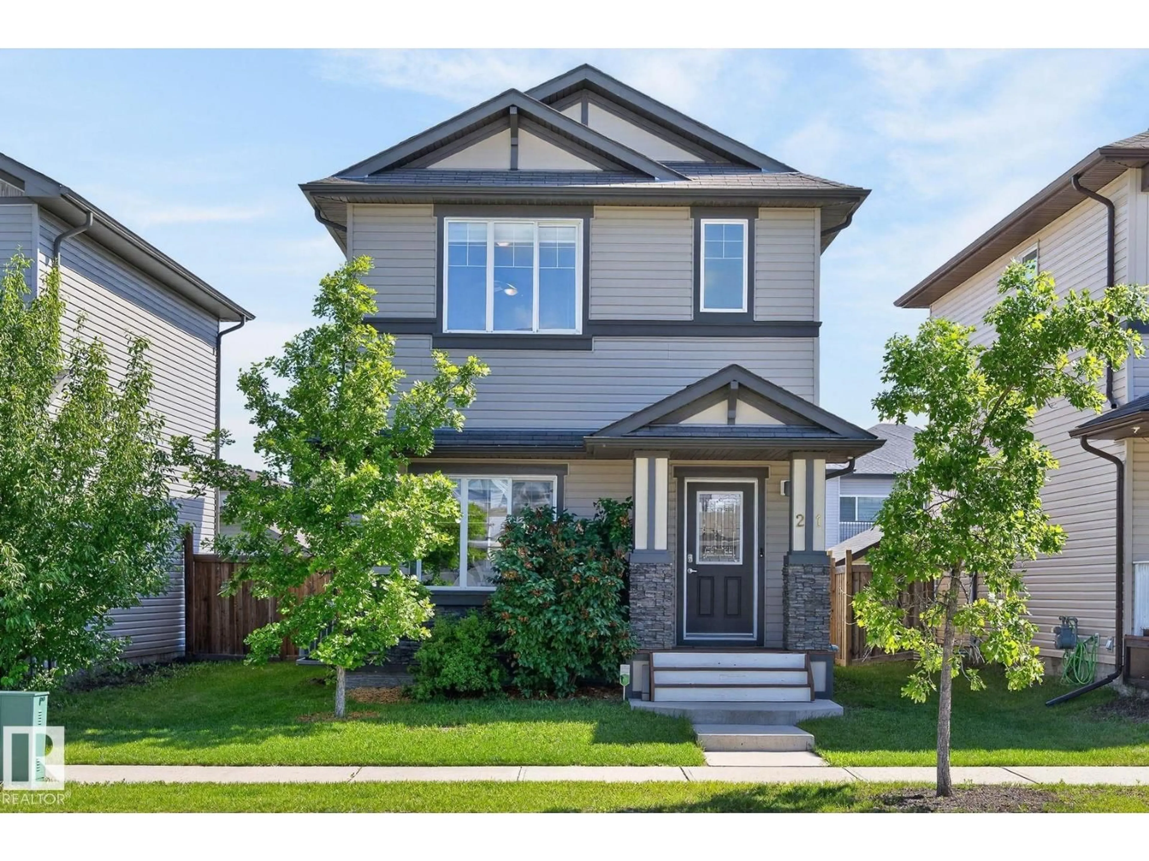 Home with vinyl exterior material, street for 21 CURRANT CR, Fort Saskatchewan Alberta T8L0R9