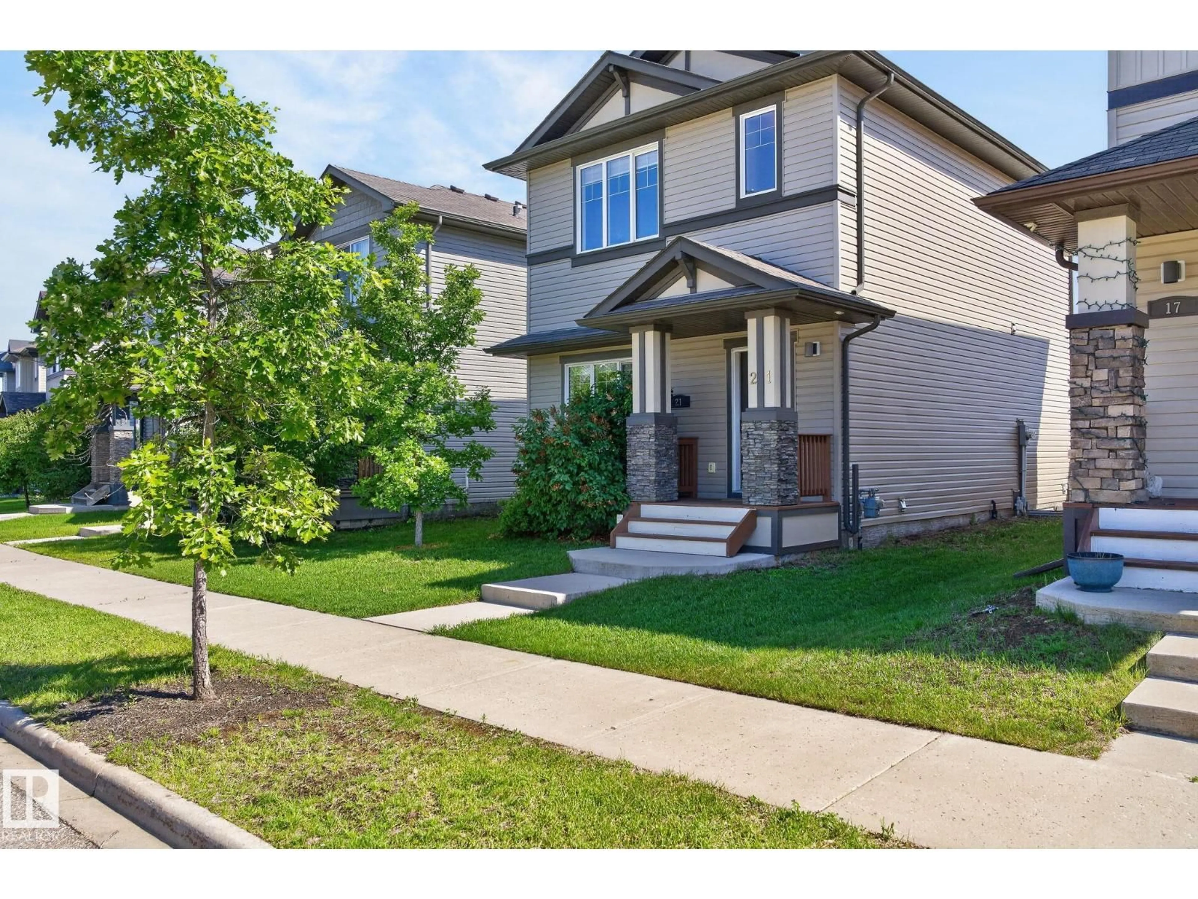 Home with vinyl exterior material, street for 21 CURRANT CR, Fort Saskatchewan Alberta T8L0R9